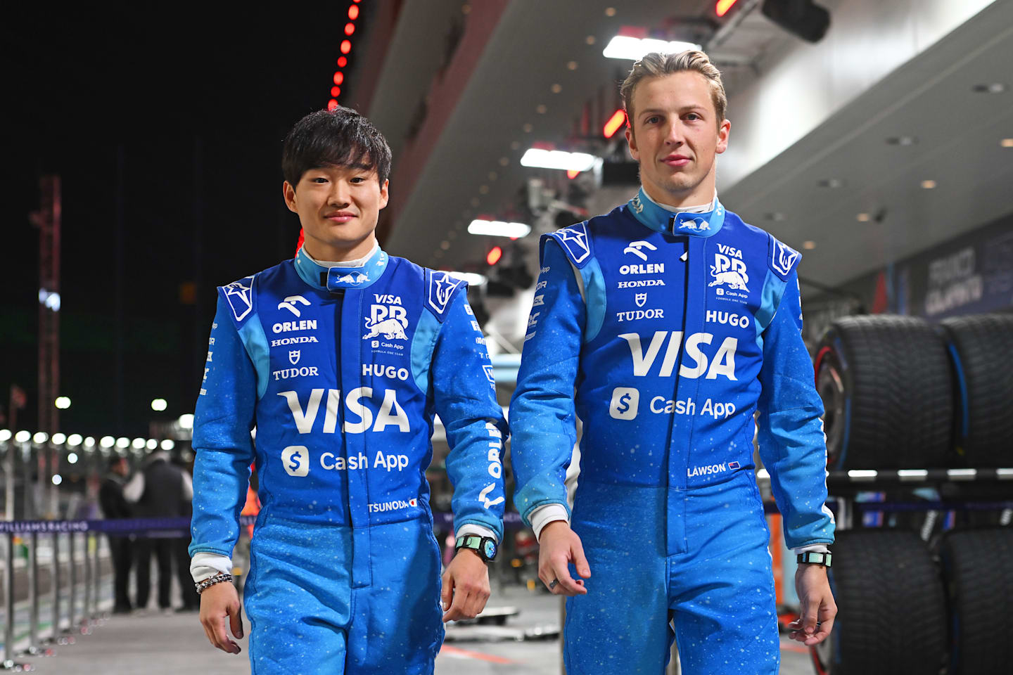LAS VEGAS, NEVADA - NOVEMBER 20: Yuki Tsunoda of Japan and Visa Cash App RB and Liam Lawson of New