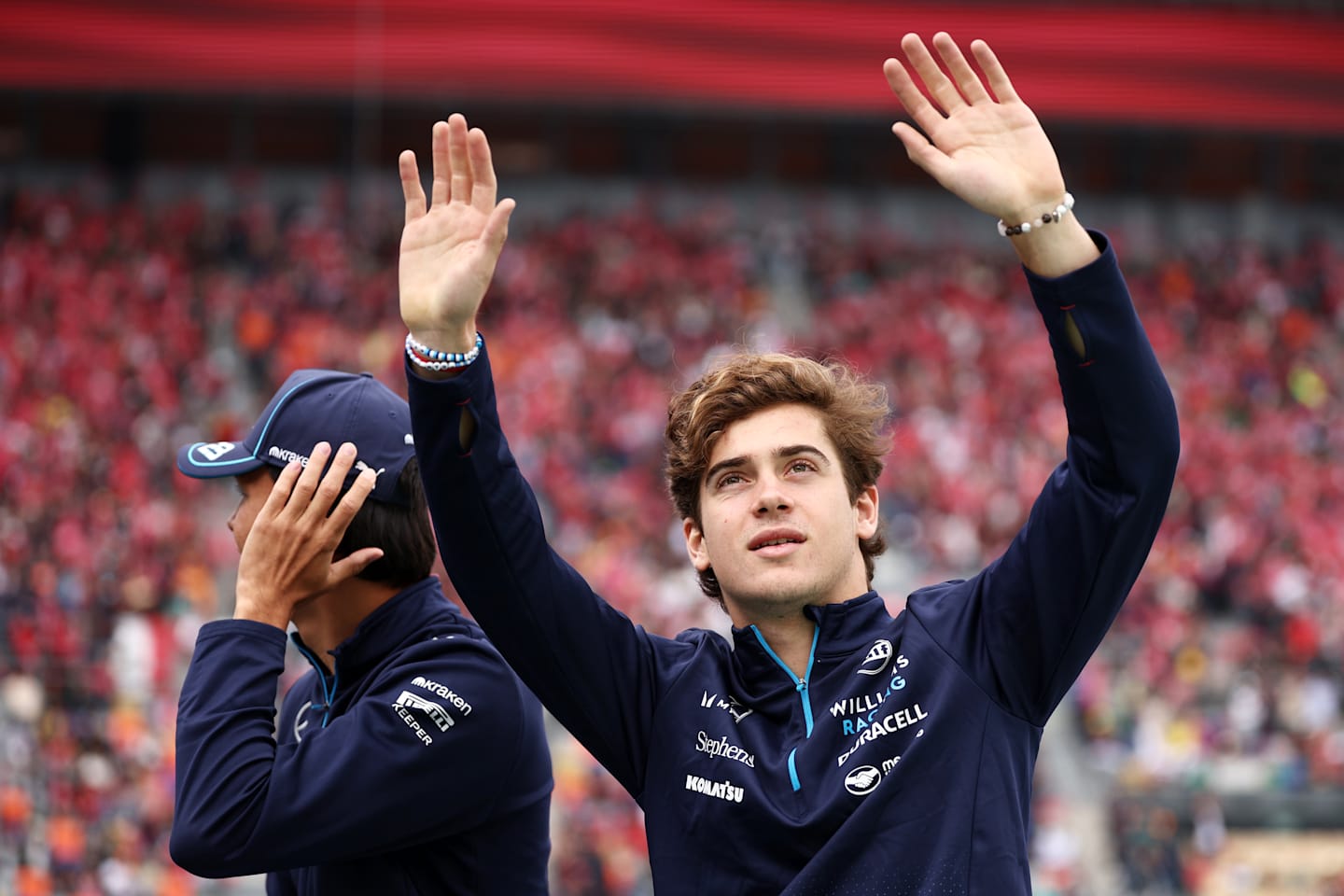 MEXICO CITY, MEXICO - OCTOBER 27: Franco Colapinto waves to the crowd on the drivers parade prior to the F1 Grand Prix of Mexico at Autodromo Hermanos Rodriguez on October 27, 2024 in Mexico City, Mexico. (Photo by Jared C. Tilton/Getty Images)