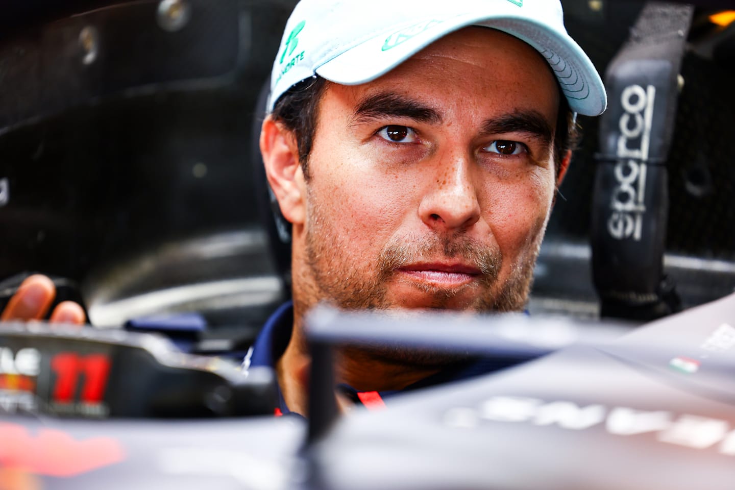 MEXICO CITY, MEXICO - OCTOBER 24: Sergio Perez of Mexico and Oracle Red Bull Racing has a seat fitting in the garage during previews ahead of the F1 Grand Prix of Mexico at Autodromo Hermanos Rodriguez. (Photo by Mark Thompson/Getty Images)