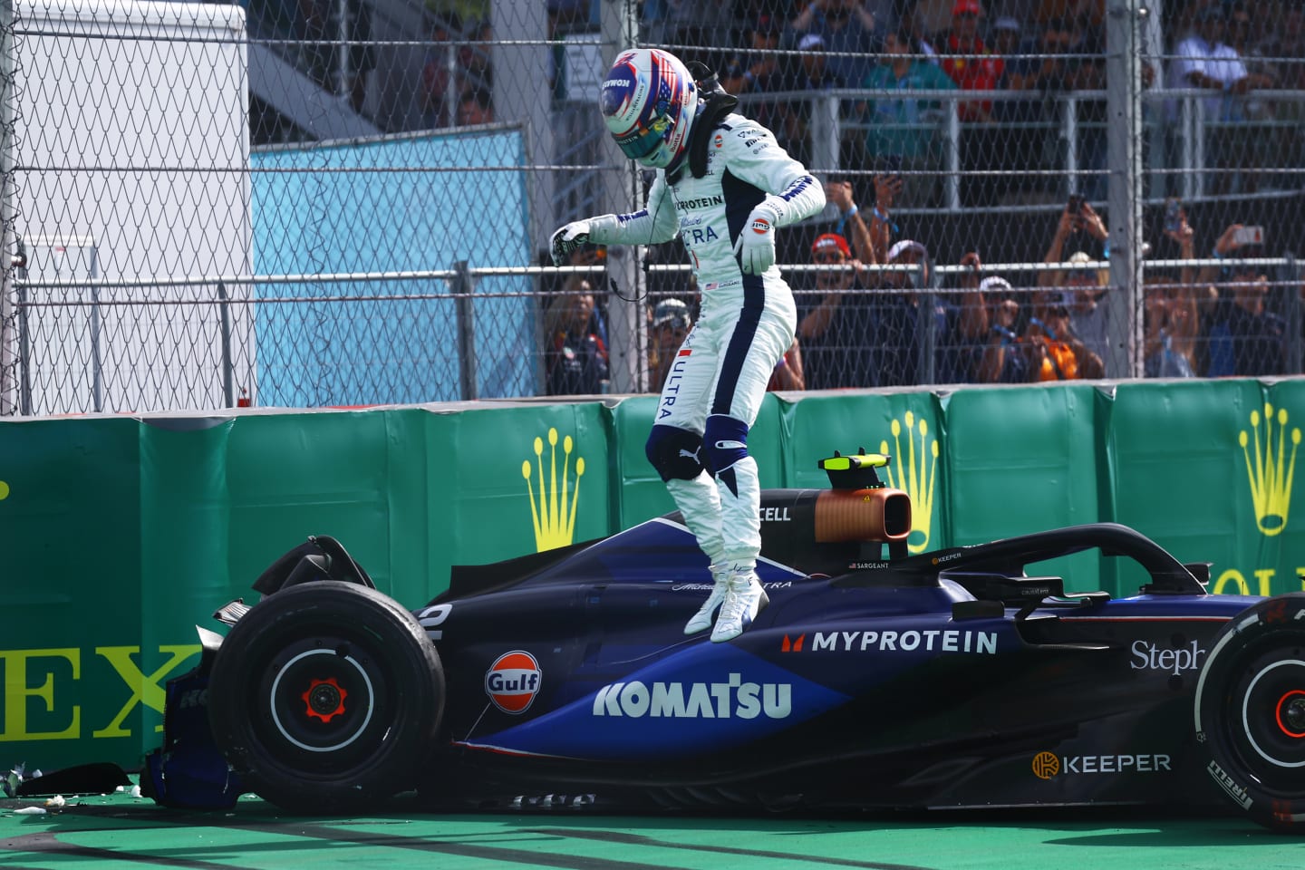 MIAMI, FLORIDA - MAY 05: Logan Sargeant of United States and Williams jumps from his car after crashing during the F1 Grand Prix of Miami at Miami International Autodrome on May 05, 2024 in Miami, Florida. (Photo by Mark Thompson/Getty Images)