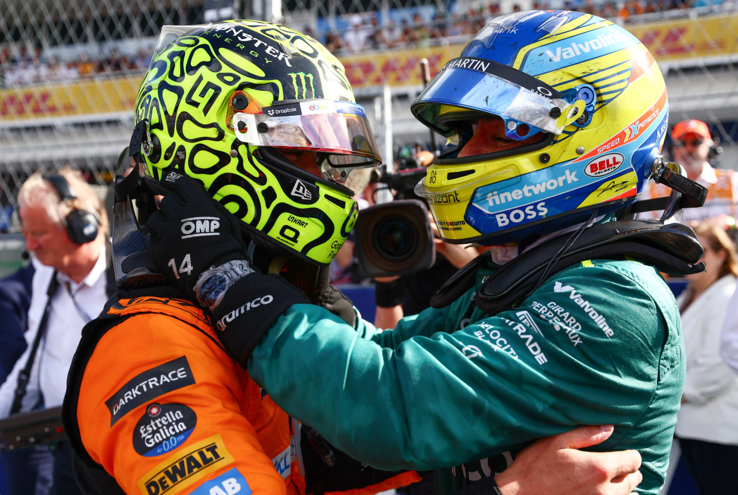 MIAMI, FLORIDA - MAY 05: Race winner Lando Norris of Great Britain and McLaren celebrates with Fernando Alonso of Spain and Aston Martin F1 Team in parc ferme after the F1 Grand Prix of Miami at Miami International Autodrome on May 05, 2024 in Miami, Florida. (Photo by Clive Rose - Formula 1/Formula 1 via Getty Images)