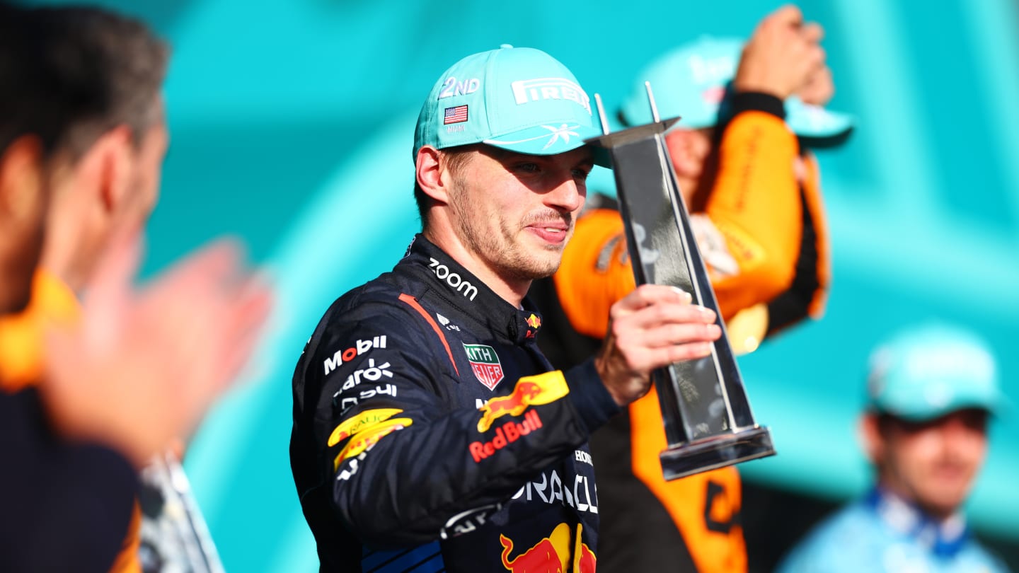 MIAMI, FLORIDA - MAY 05: Second placed Max Verstappen of the Netherlands and Oracle Red Bull Racing celebrates with his trophy on the podium after the F1 Grand Prix of Miami at Miami International Autodrome on May 05, 2024 in Miami, Florida. (Photo by Clive Rose - Formula 1/Formula 1 via Getty Images)