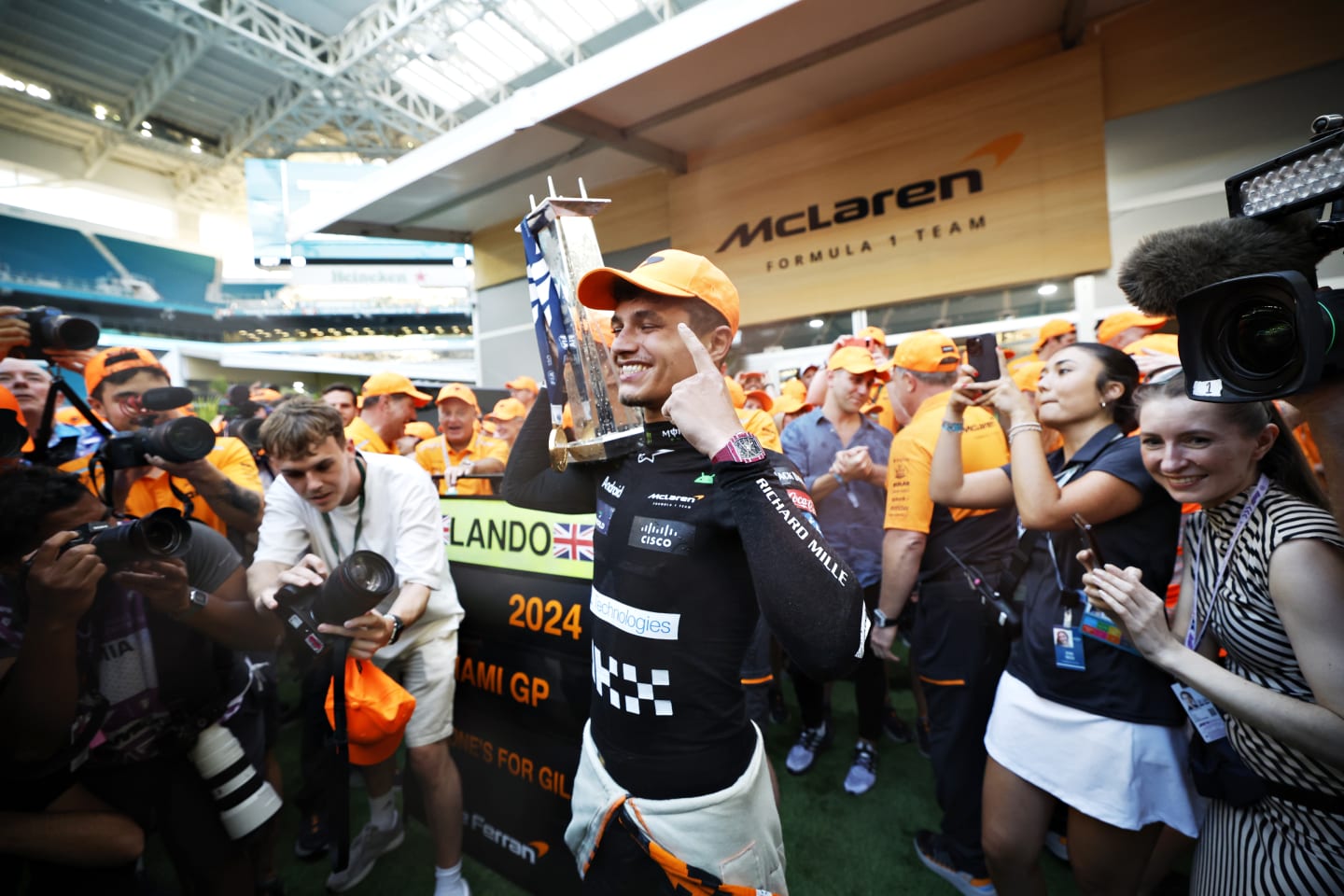 MIAMI, FLORIDA - MAY 05: Race winner Lando Norris of Great Britain and McLaren celebrates victory