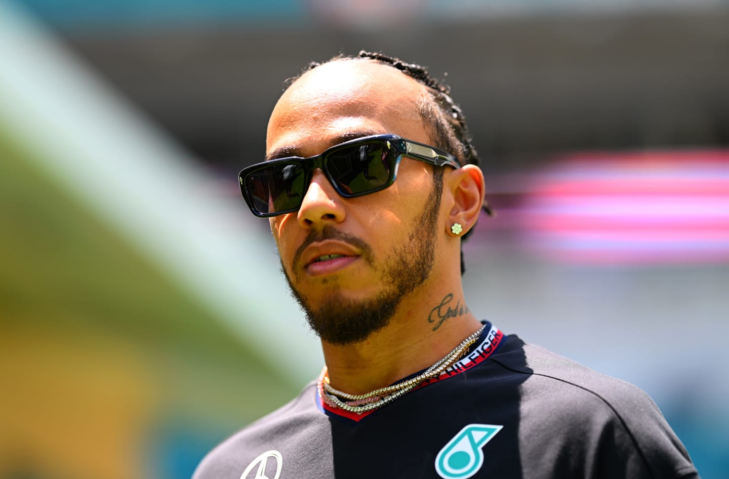 MIAMI, FLORIDA - MAY 02: Lewis Hamilton of Great Britain and Mercedes looks on in the Paddock