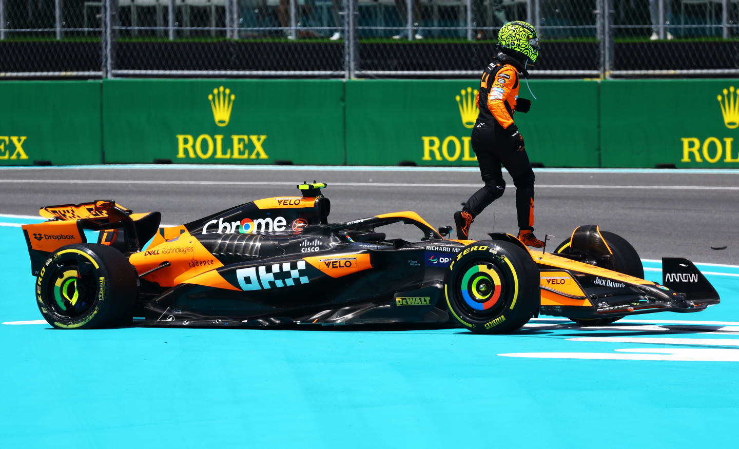 MIAMI, FLORIDA - MAY 04: Lando Norris of Great Britain and McLaren walks away from his car after stopping on track during the Sprint ahead of the F1 Grand Prix of Miami at Miami International Autodrome on May 04, 2024 in Miami, Florida. (Photo by Mark Thompson/Getty Images)