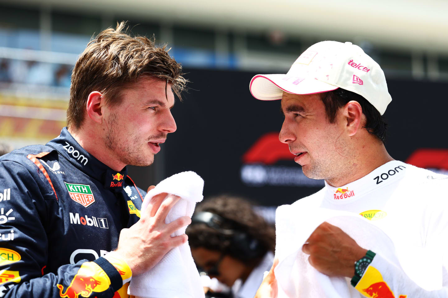 MIAMI, FLORIDA - MAY 04: Sprint winner Max Verstappen of the Netherlands and Oracle Red Bull Racing talks with Third placed Sergio Perez of Mexico and Oracle Red Bull Racing in parc ferme during the Sprint ahead of the F1 Grand Prix of Miami at Miami International Autodrome on May 04, 2024 in Miami, Florida. (Photo by Mark Thompson/Getty Images)