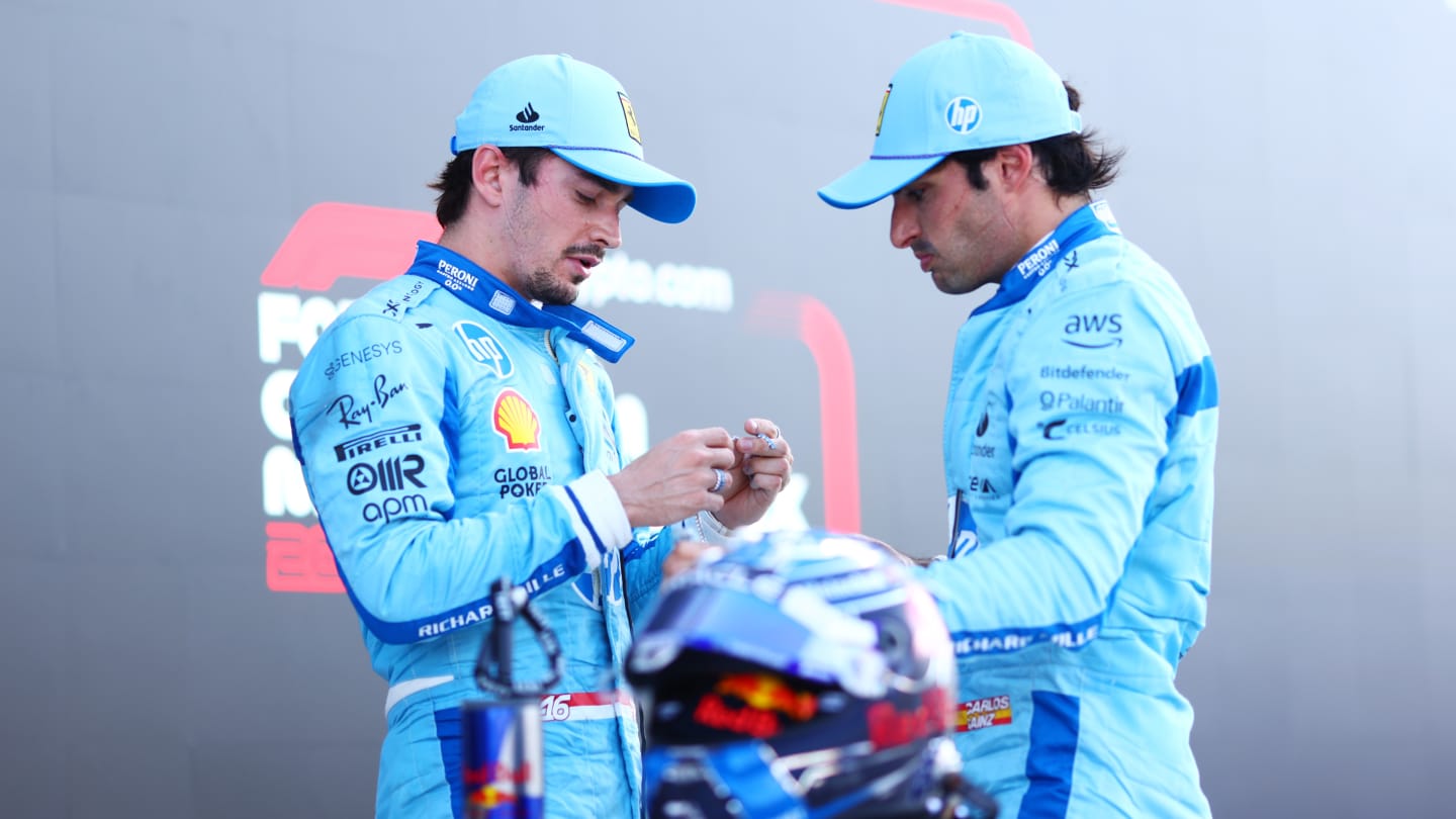 MIAMI, FLORIDA - MAY 04: Second placed qualifier Charles Leclerc of Monaco and Ferrari and Third placed qualifier Carlos Sainz of Spain and Ferrari talk in parc ferme during qualifying ahead of the F1 Grand Prix of Miami at Miami International Autodrome on May 04, 2024 in Miami, Florida. (Photo by Clive Rose - Formula 1/Formula 1 via Getty Images)