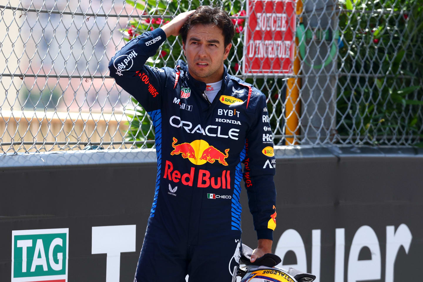 MONTE-CARLO, MONACO - MAY 26: Sergio Perez of Mexico and Oracle Red Bull Racing looks on after crashing at the start during the F1 Grand Prix of Monaco at Circuit de Monaco on May 26, 2024 in Monte-Carlo, Monaco. (Photo by Clive Rose/Getty Images)