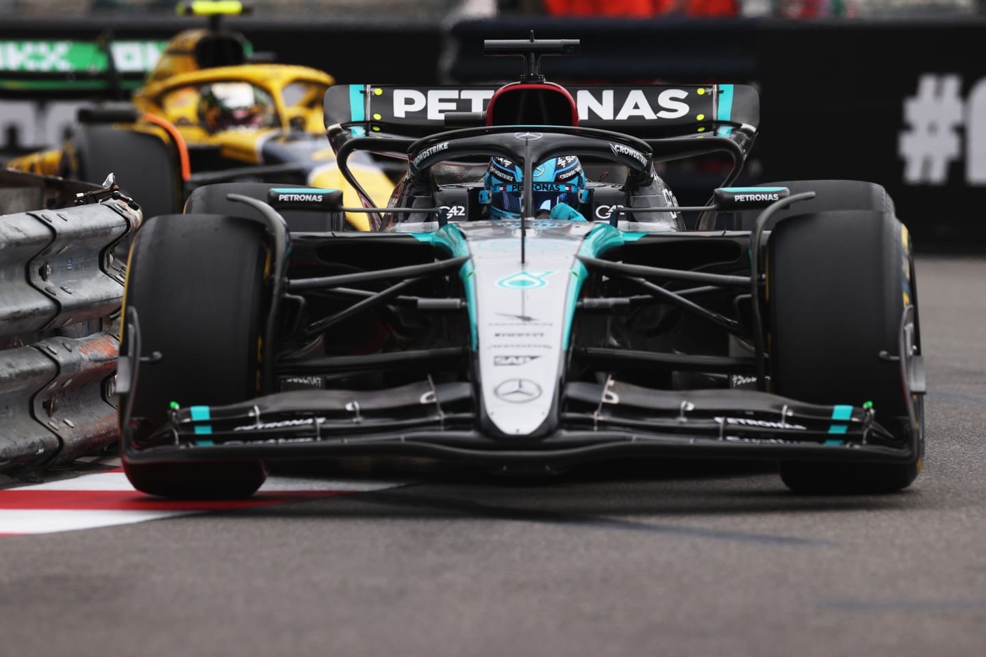MONTE-CARLO, MONACO - MAY 24: George Russell of Great Britain driving the (63) Mercedes AMG Petronas F1 Team W15 leads Lando Norris of Great Britain driving the (4) McLaren MCL38 Mercedes on track during practice ahead of the F1 Grand Prix of Monaco at Circuit de Monaco on May 24, 2024 in Monte-Carlo, Monaco. (Photo by Ryan Pierse/Getty Images)
