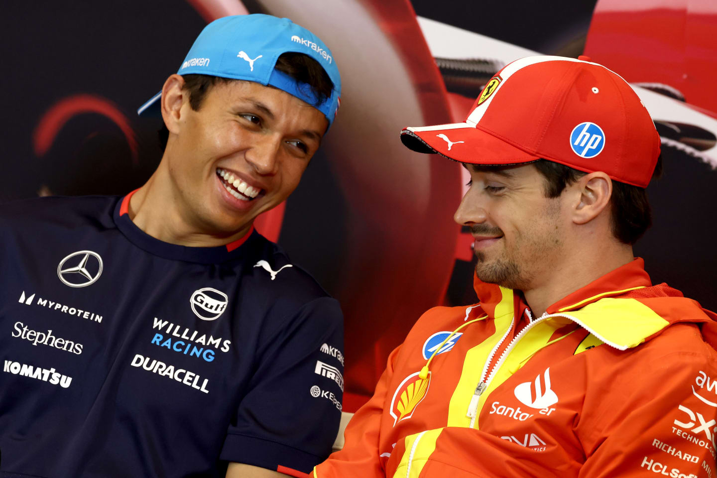 MONTE-CARLO, MONACO - MAY 23: Alexander Albon of Thailand and Williams and Charles Leclerc of Monaco and Ferrari talk in the Drivers Press Conference during previews ahead of the F1 Grand Prix of Monaco at Circuit de Monaco on May 23, 2024 in Monte-Carlo, Monaco. (Photo by Clive Rose/Getty Images)