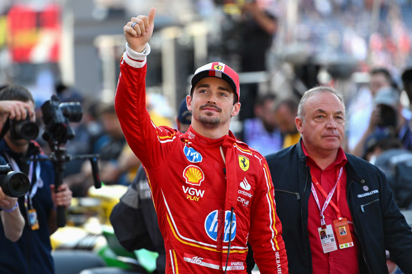 MONTE-CARLO, MONACO - MAY 25: Pole position qualifier Charles Leclerc of Monaco and Ferrari celebrates in parc ferme during qualifying ahead of the F1 Grand Prix of Monaco at Circuit de Monaco on May 25, 2024 in Monte-Carlo, Monaco. (Photo by Rudy Carezzevoli/Getty Images)