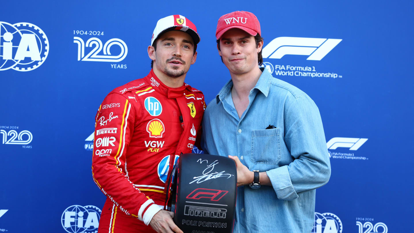 MONTE-CARLO, MONACO - MAY 25: Pole position qualifier Charles Leclerc of Monaco and Ferrari is presented with the Pirelli Pole Position Award by Nicholas Galitzine in parc ferme during qualifying ahead of the F1 Grand Prix of Monaco at Circuit de Monaco on May 25, 2024 in Monte-Carlo, Monaco. (Photo by Bryn Lennon - Formula 1/Formula 1 via Getty Images)
