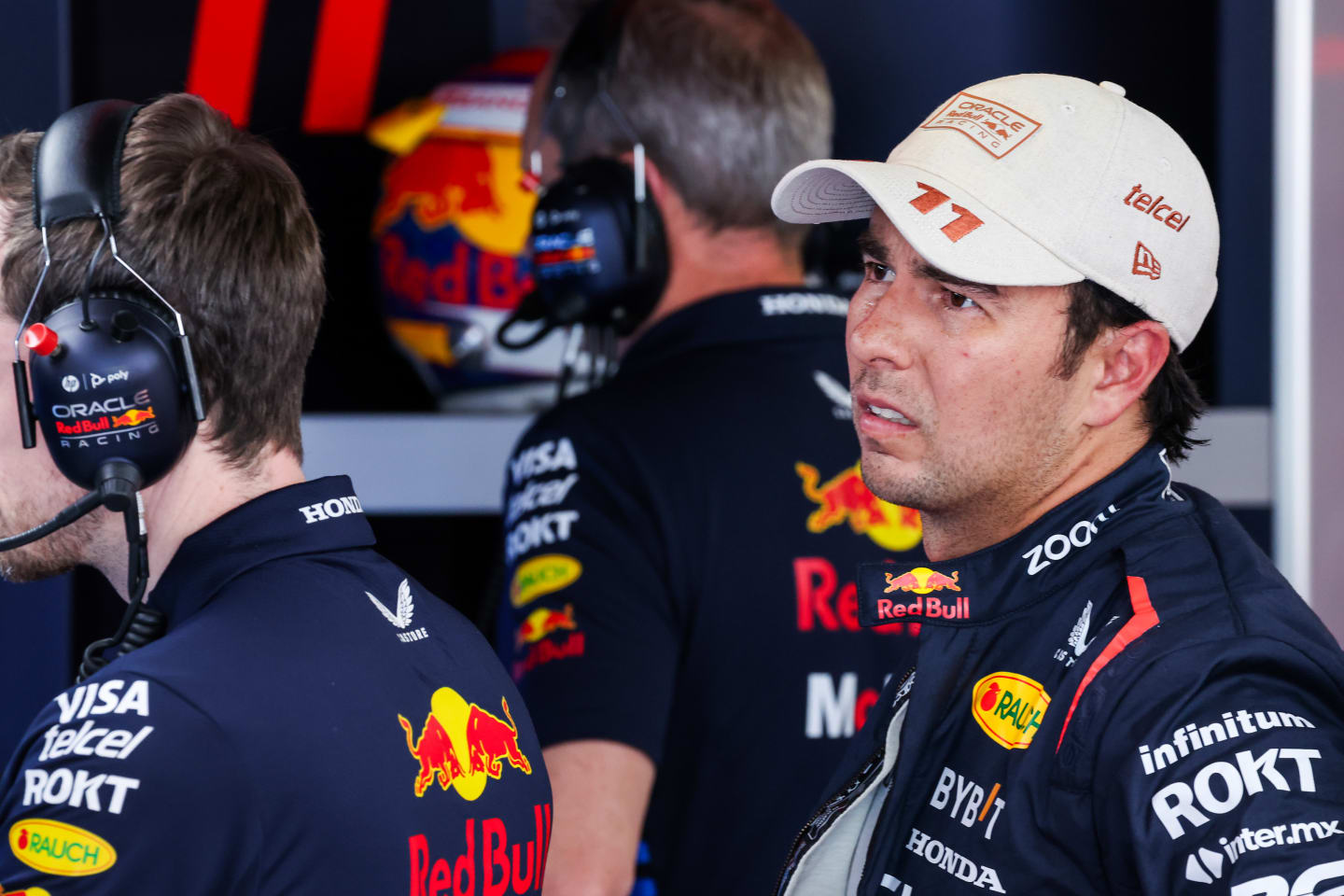 MONTE-CARLO, MONACO - MAY 25: 18th placed qualifier Sergio Perez of Mexico and Oracle Red Bull Racing looks on in the garage during qualifying ahead of the F1 Grand Prix of Monaco at Circuit de Monaco on May 25, 2024 in Monte-Carlo, Monaco. (Photo by Mark Thompson/Getty Images)