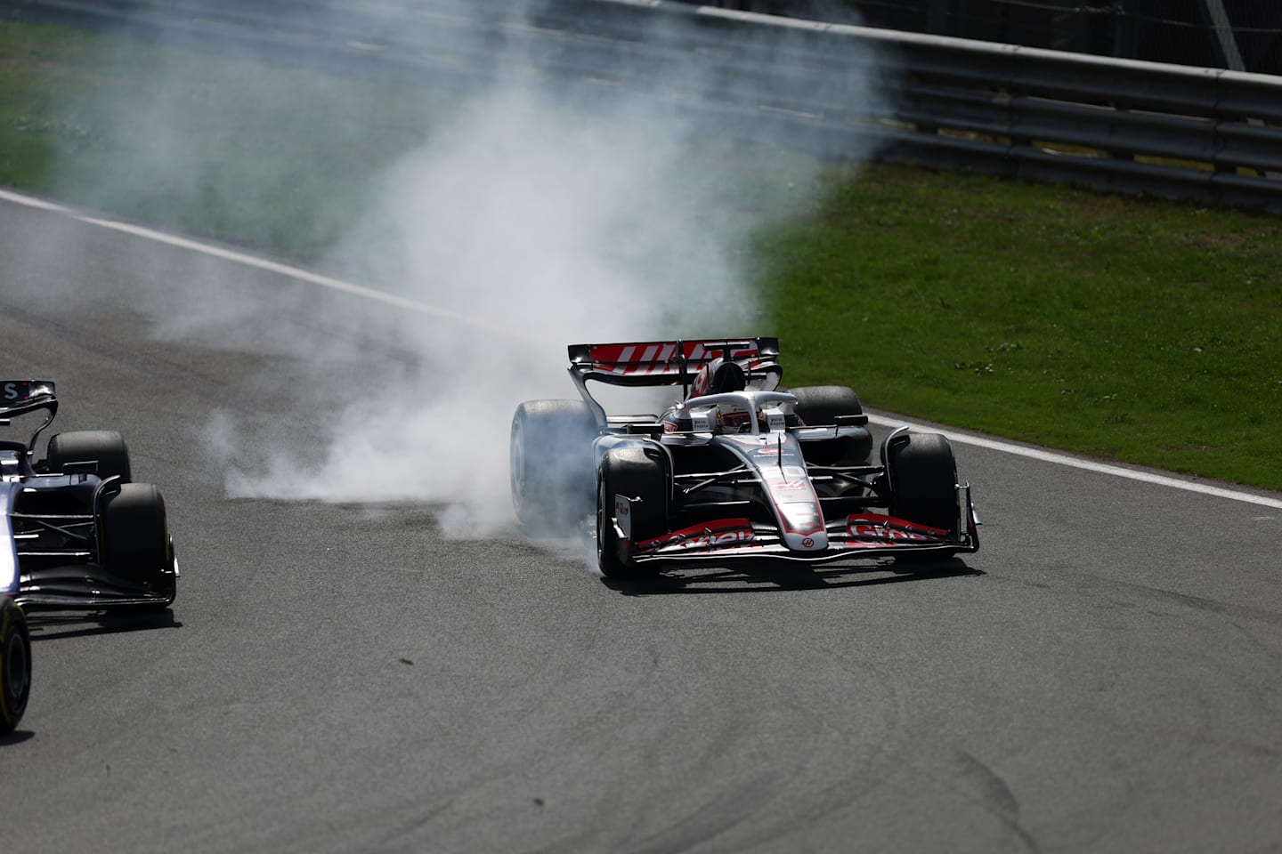 ZANDVOORT, NETHERLANDS - AUGUST 25: Kevin Magnussen of Denmark driving the (20) Haas F1 VF-24 Ferrari locks a wheel under braking during the F1 Grand Prix of Netherlands at Circuit Zandvoort on August 25, 2024 in Zandvoort, Netherlands. (Photo by Bryn Lennon - Formula 1/Formula 1 via Getty Images)