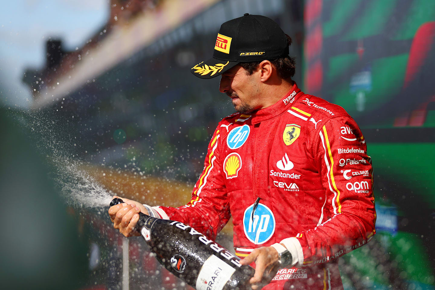 ZANDVOORT, NETHERLANDS - AUGUST 25: Third placed Charles Leclerc of Monaco driving the (16) Ferrari SF-24 celebrates in parc ferme after the F1 Grand Prix of Netherlands at Circuit Zandvoort on August 25, 2024 in Zandvoort, Netherlands.  (Photo by Bryn Lennon - Formula 1/Formula 1 via Getty Images)