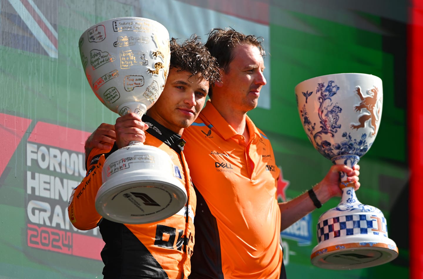 ZANDVOORT, NETHERLANDS - AUGUST 25: Race winner Lando Norris of Great Britain and McLaren and Will Joseph, Director, Race Engineering at McLaren celebrate in parc ferme after the F1 Grand Prix of Netherlands at Circuit Zandvoort on August 25, 2024 in Zandvoort, Netherlands. (Photo by Rudy Carezzevoli/Getty Images)