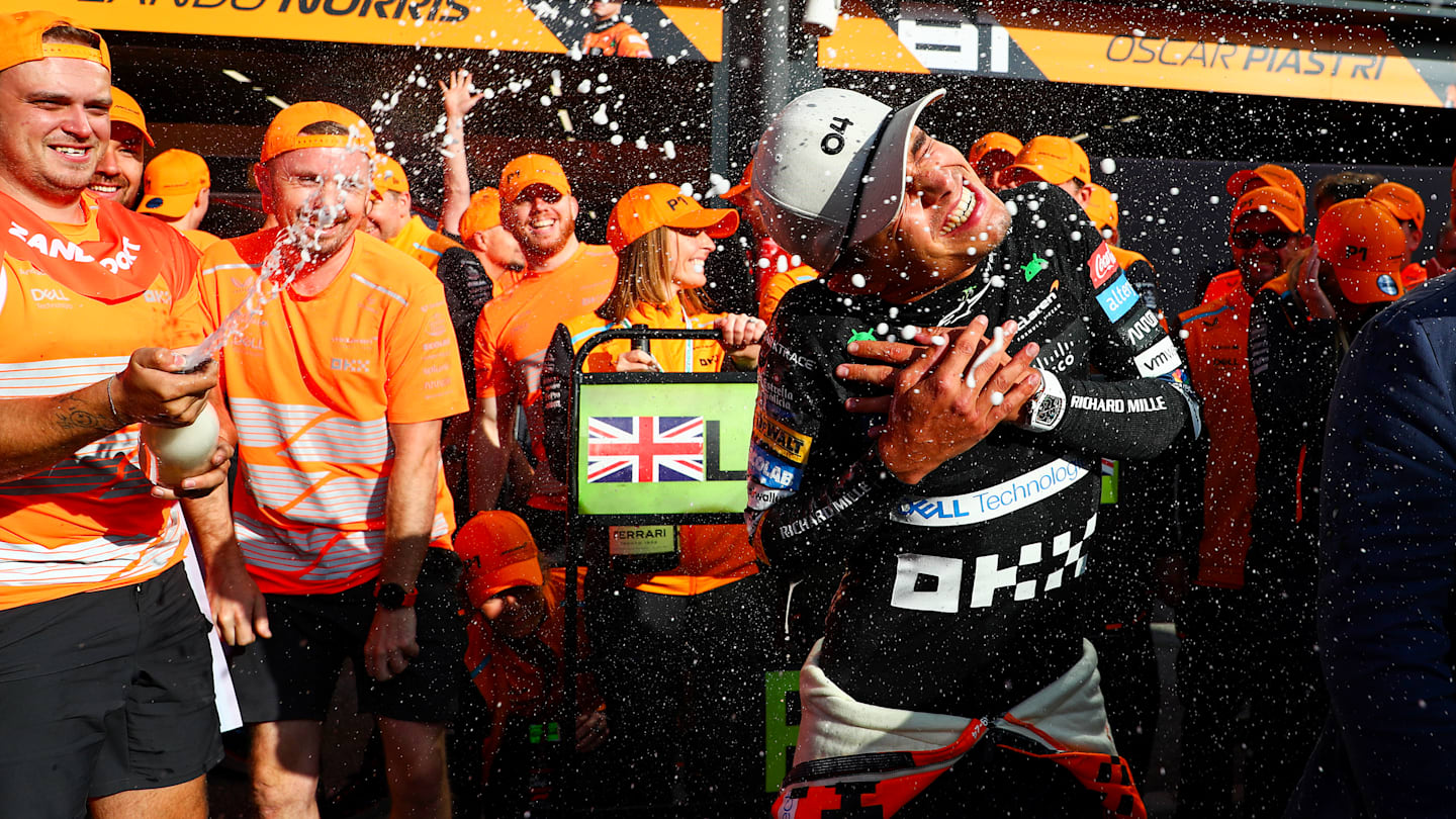 ZANDVOORT, NETHERLANDS - AUGUST 25: Lando Norris of McLaren and Great Britain celebrates finishing in first position during the F1 Grand Prix of Netherlands at Circuit Zandvoort. (Photo by Peter Fox - Formula 1/Formula 1 via Getty Images)