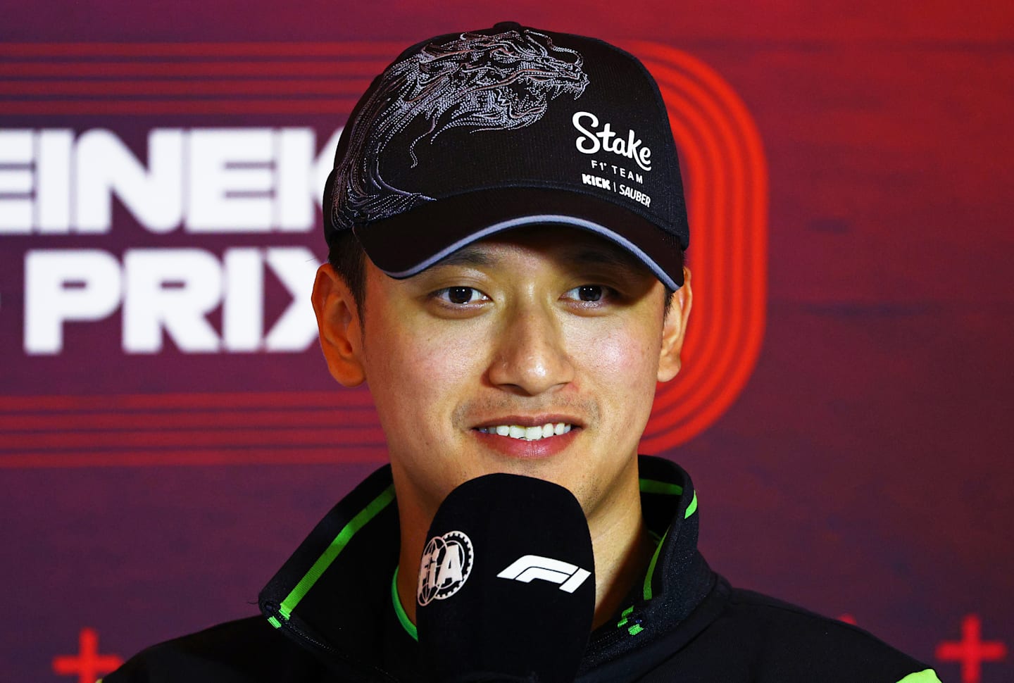 ZANDVOORT, NETHERLANDS - AUGUST 22: Zhou Guanyu of China and Stake F1 Team Kick Sauber attends the Drivers Press Conference during previews ahead of the F1 Grand Prix of Netherlands at Circuit Zandvoort on August 22, 2024 in Zandvoort, Netherlands. (Photo by Clive Rose/Getty Images)