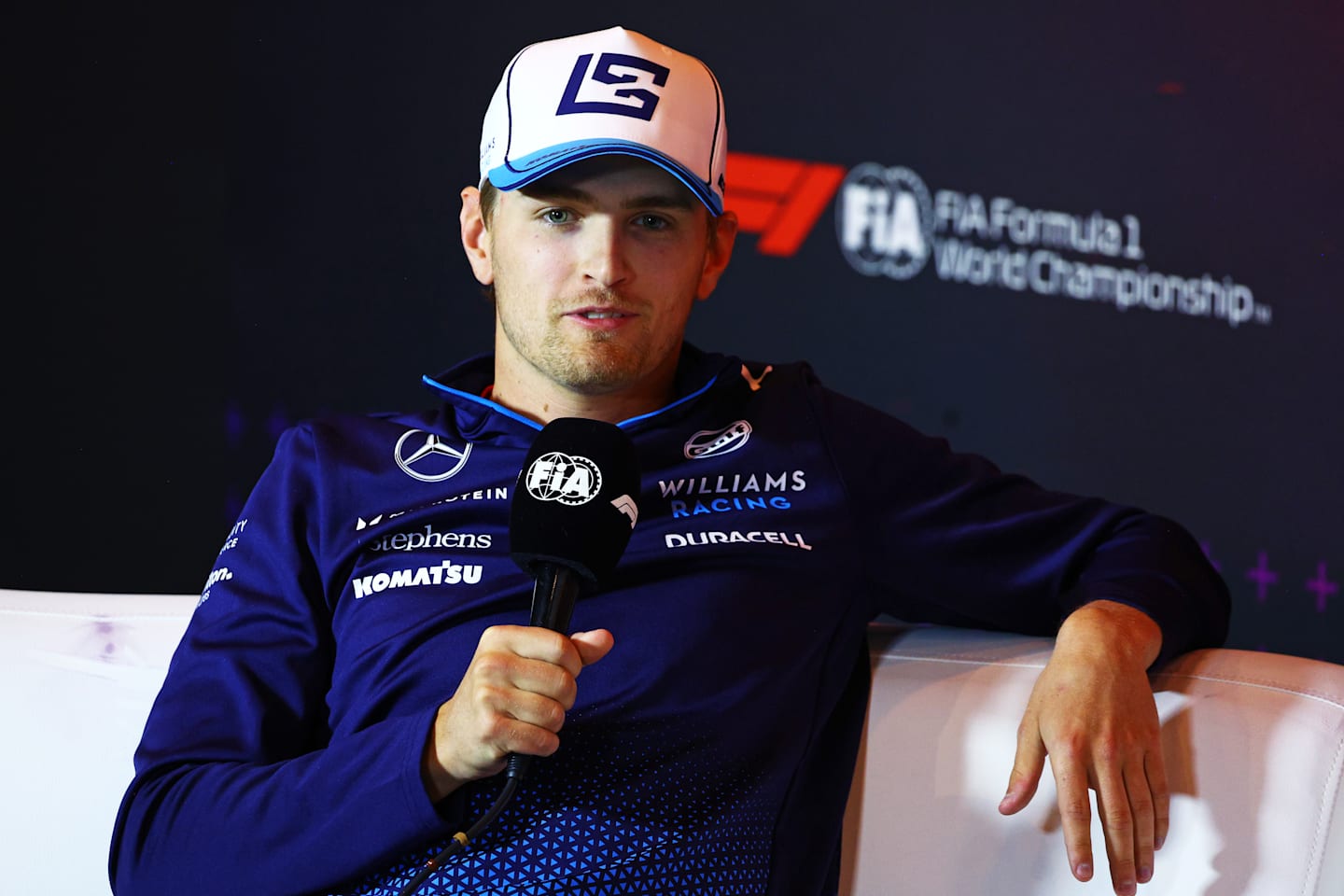 ZANDVOORT, NETHERLANDS - AUGUST 22: Logan Sargeant of United States and Williams attends the Drivers Press Conference during previews ahead of the F1 Grand Prix of Netherlands at Circuit Zandvoort on August 22, 2024 in Zandvoort, Netherlands. (Photo by Clive Rose/Getty Images)