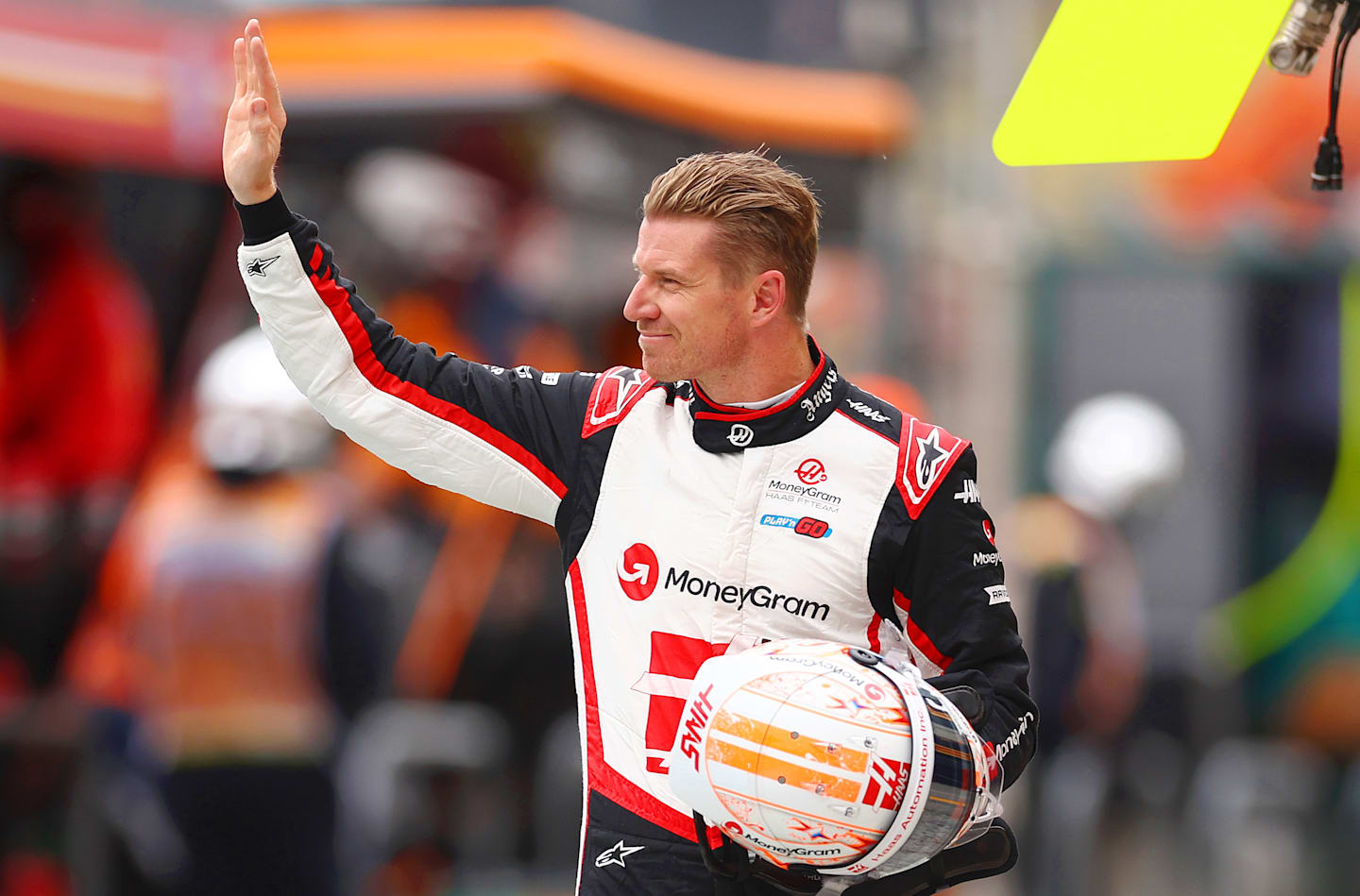 ZANDVOORT, NETHERLANDS - AUGUST 24: 14th place qualifier Nico Hulkenberg of Germany and Haas F1 acknowledges the fans from the Pitlane during qualifying ahead of the F1 Grand Prix of Netherlands at Circuit Zandvoort on August 24, 2024 in Zandvoort, Netherlands. (Photo by Bryn Lennon - Formula 1/Formula 1 via Getty Images)