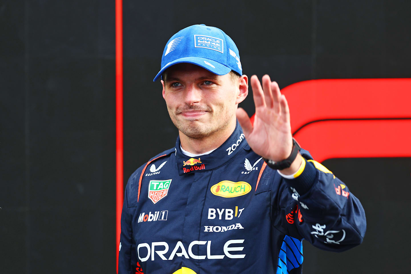 ZANDVOORT, NETHERLANDS - AUGUST 24: Second placed qualifier Max Verstappen of the Netherlands and Oracle Red Bull Racing acknowledges fans in parc ferme after qualifying ahead of the F1 Grand Prix of Netherlands at Circuit Zandvoort on August 24, 2024 in Zandvoort, Netherlands. (Photo by Mark Thompson/Getty Images)