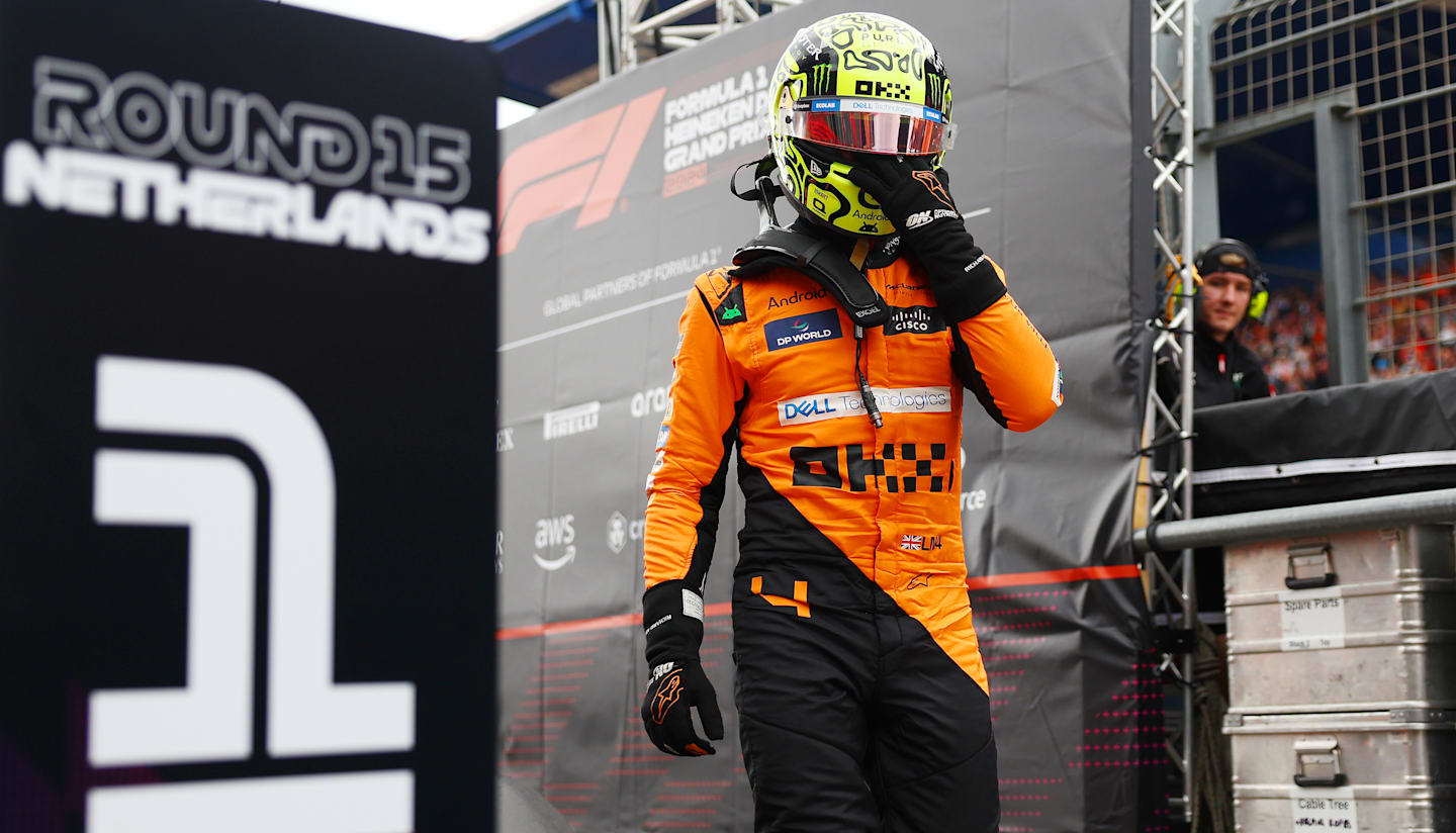 ZANDVOORT, NETHERLANDS - AUGUST 24: Pole position qualifier Lando Norris of Great Britain and McLaren looks on in parc ferme after qualifying ahead of the F1 Grand Prix of Netherlands at Circuit Zandvoort on August 24, 2024 in Zandvoort, Netherlands. (Photo by Bryn Lennon - Formula 1/Formula 1 via Getty Images)