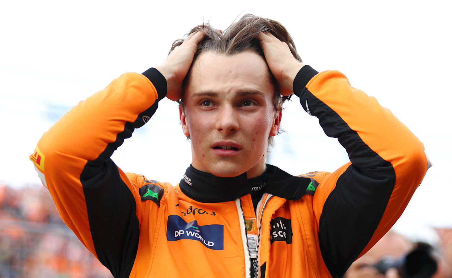 ZANDVOORT, NETHERLANDS - AUGUST 24: Third placed qualifier Oscar Piastri of Australia and McLaren looks on in parc ferme during qualifying ahead of the F1 Grand Prix of Netherlands at Circuit Zandvoort on August 24, 2024 in Zandvoort, Netherlands. (Photo by Bryn Lennon - Formula 1/Formula 1 via Getty Images)