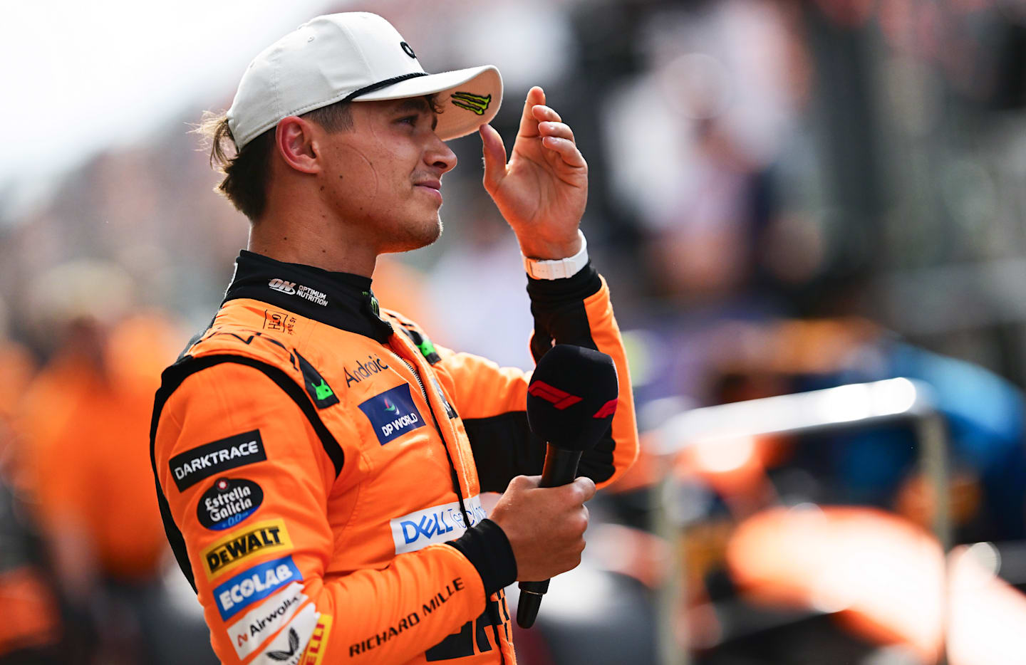 ZANDVOORT, NETHERLANDS - AUGUST 24: Pole position qualifier Lando Norris of Great Britain and McLaren looks on in parc ferme after qualifying ahead of the F1 Grand Prix of Netherlands at Circuit Zandvoort on August 24, 2024 in Zandvoort, Netherlands. (Photo by Mario Renzi - Formula 1/Formula 1 via Getty Images)