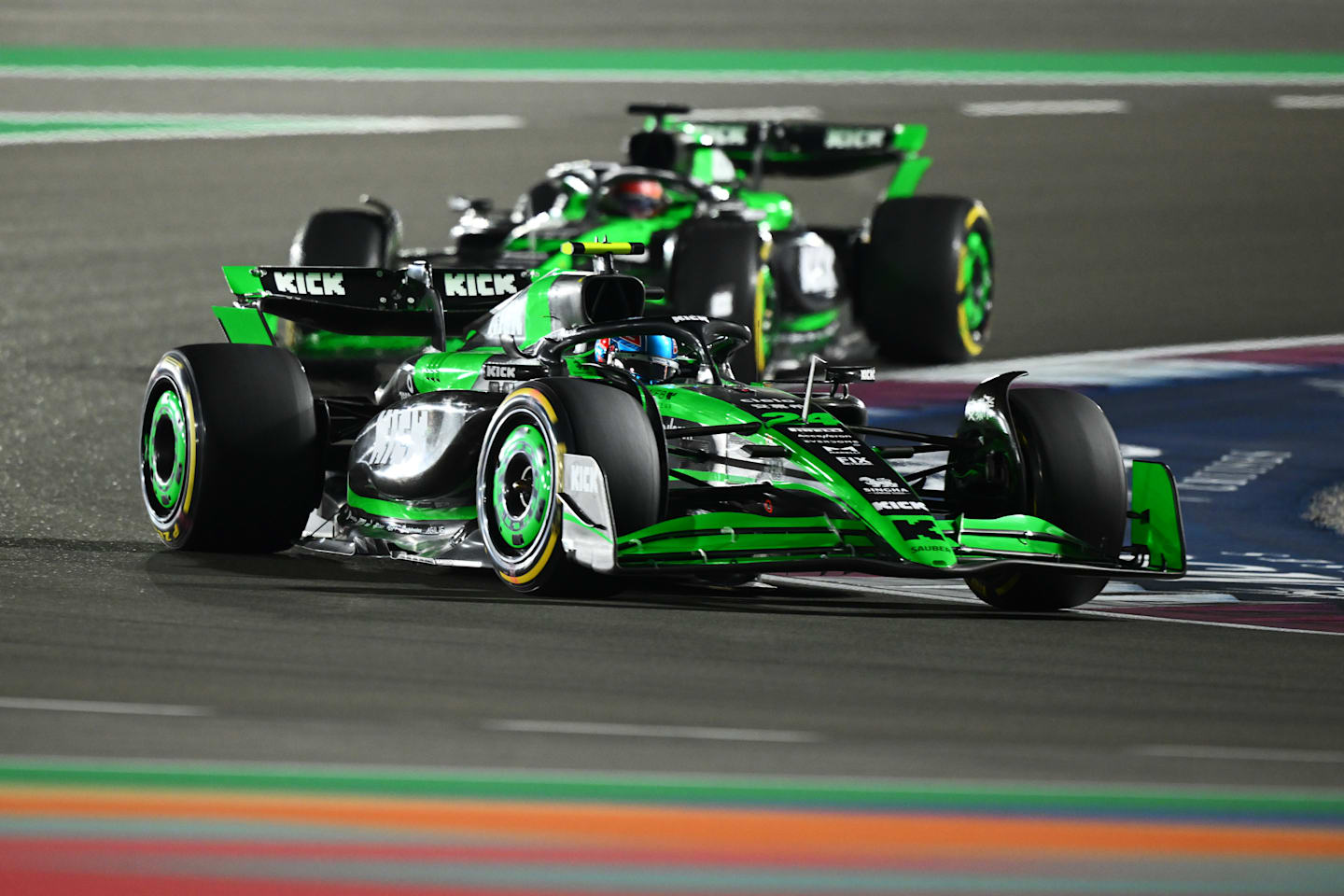 Zhou Guanyu leads Valtteri Bottas of Finland driving the (77) Kick Sauber C44 Ferrari on track during the F1 Grand Prix of Qatar at Lusail International Circuit on December 01, 2024 in Lusail City, Qatar. (Photo by Clive Mason/Getty Images)