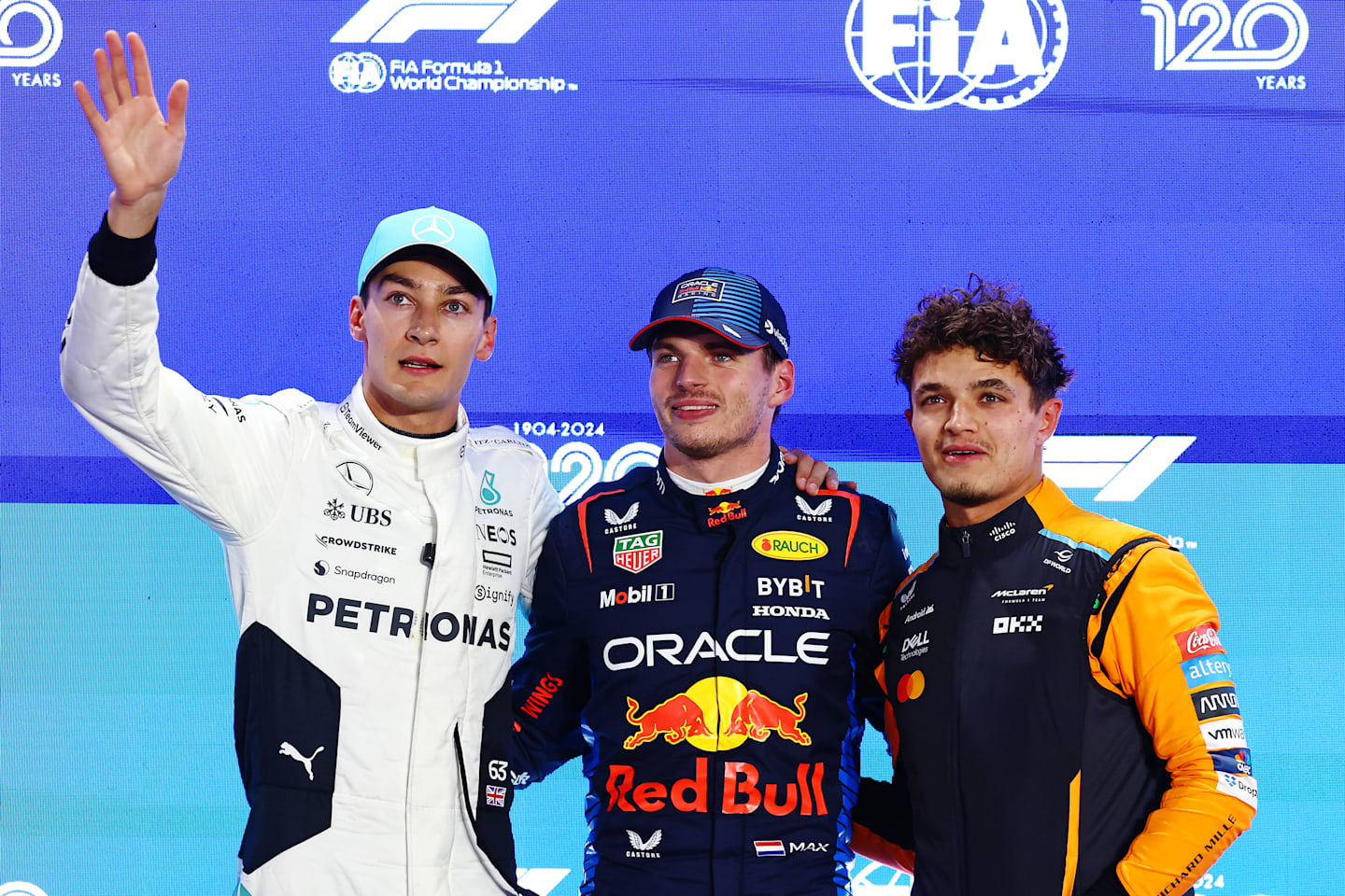 Max Verstappen, George Russell and Lando Norris pose for a photo in parc ferme during qualifying ahead of the F1 Grand Prix of Qatar at Lusail International Circuit on November 30, 2024 in Lusail City, Qatar. (Photo by Mark Thompson/Getty Images)