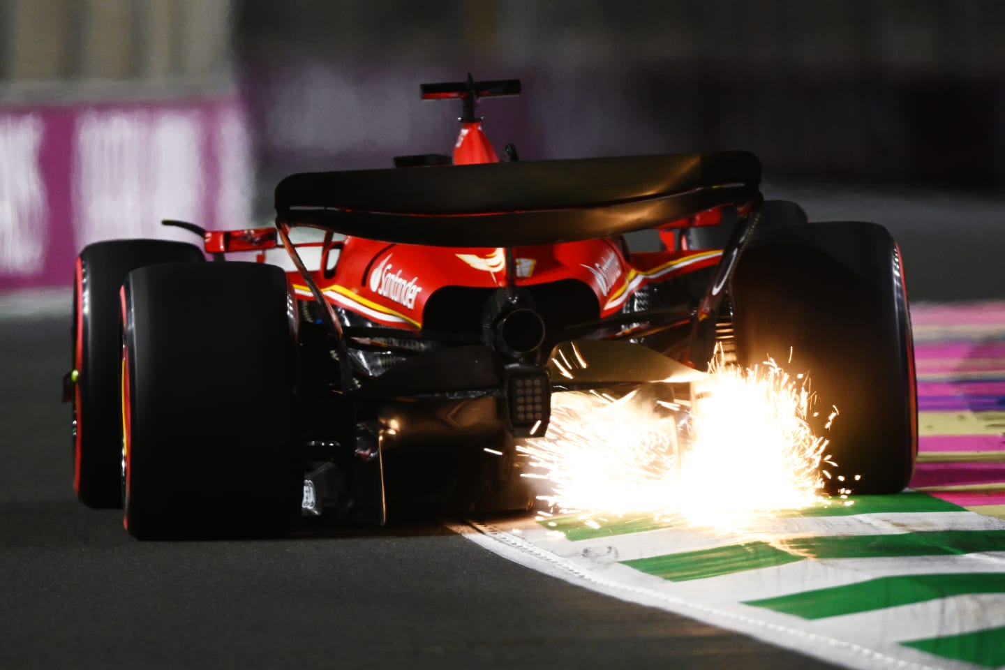 JEDDAH, SAUDI ARABIA - MARCH 08: Sparks fly behind Charles Leclerc of Monaco driving the (16) Ferrari SF-24 on track during qualifying ahead of the F1 Grand Prix of Saudi Arabia at Jeddah Corniche Circuit on March 08, 2024 in Jeddah, Saudi Arabia. (Photo by Clive Mason/Getty Images)