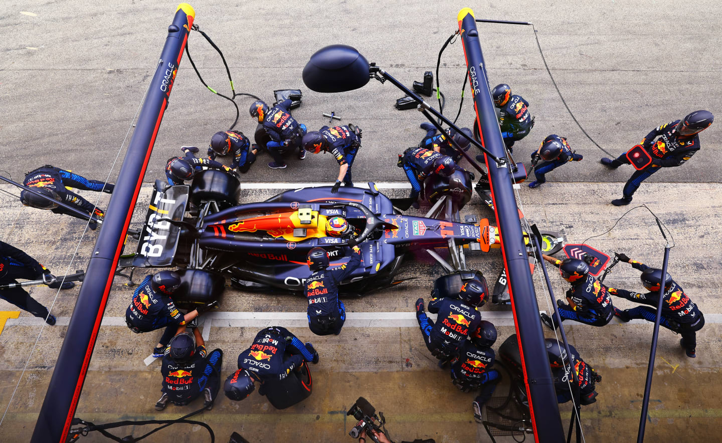 BARCELONA, SPAIN - JUNE 23: Sergio Perez of Mexico driving the (11) Oracle Red Bull Racing RB20 makes a pitstop during the F1 Grand Prix of Spain at Circuit de Barcelona-Catalunya on June 23, 2024 in Barcelona, Spain. (Photo by Clive Rose - Formula 1/Formula 1 via Getty Images)