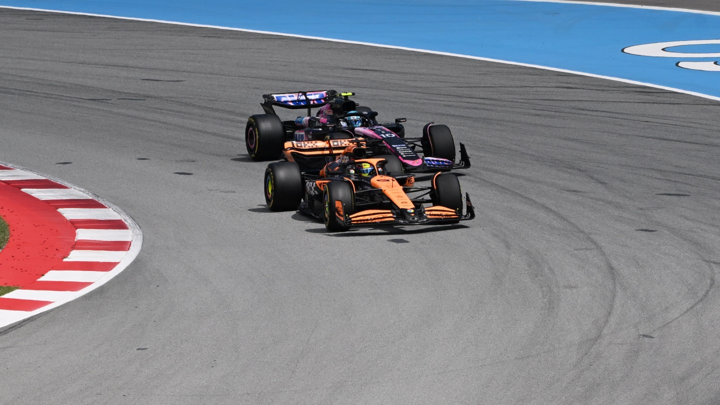 BARCELONA, SPAIN - JUNE 23: Oscar Piastri of Australia driving the (81) McLaren MCL38 Mercedes leads Pierre Gasly of France driving the (10) Alpine F1 A524 Renault during the F1 Grand Prix of Spain at Circuit de Barcelona-Catalunya on June 23, 2024 in Barcelona, Spain. (Photo by Mark Sutton - Formula 1/Formula 1 via Getty Images)