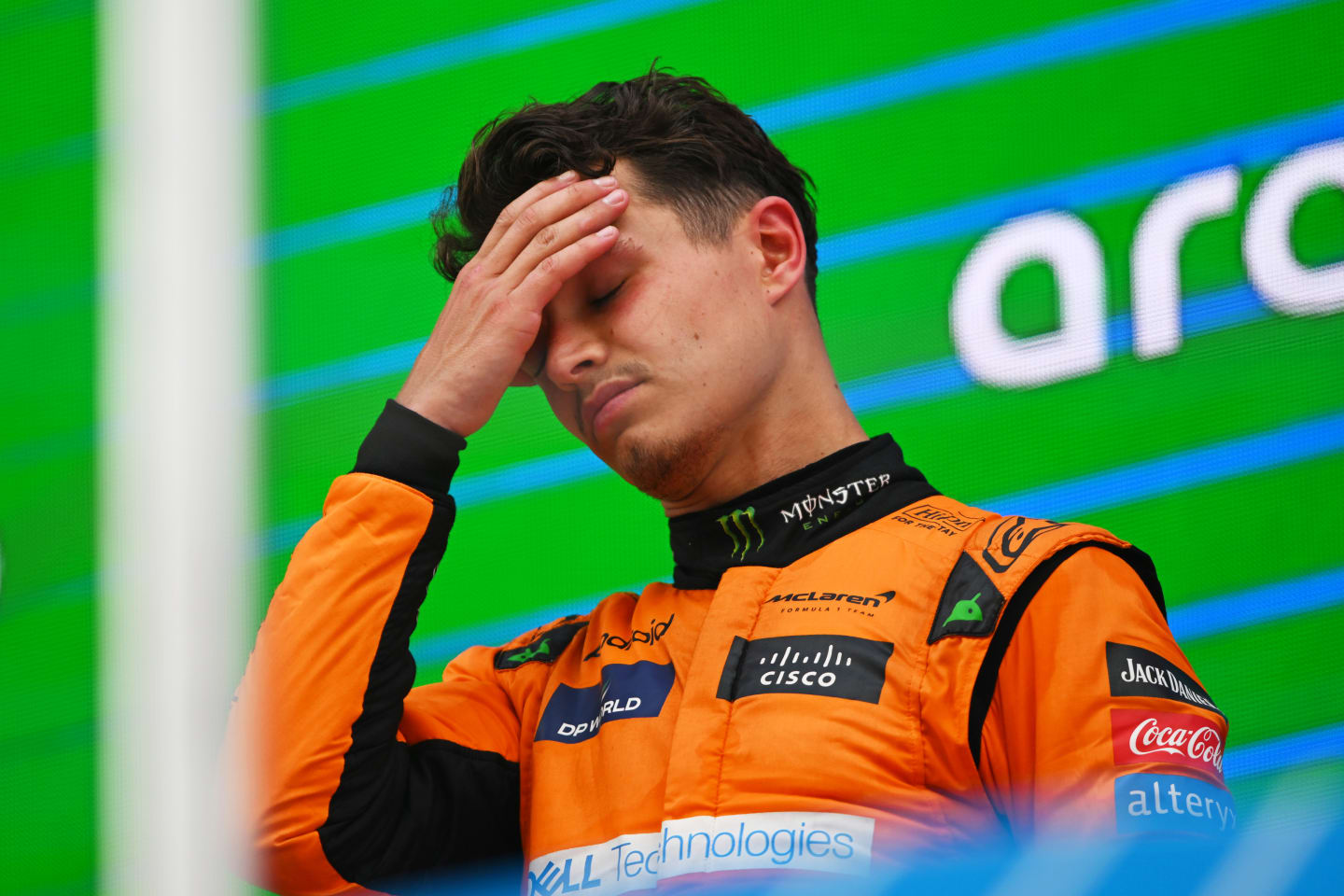 BARCELONA, SPAIN - JUNE 23: Second placed Lando Norris of Great Britain and McLaren reacts on the podium during the F1 Grand Prix of Spain at Circuit de Barcelona-Catalunya on June 23, 2024 in Barcelona, Spain. (Photo by Rudy Carezzevoli/Getty Images)
