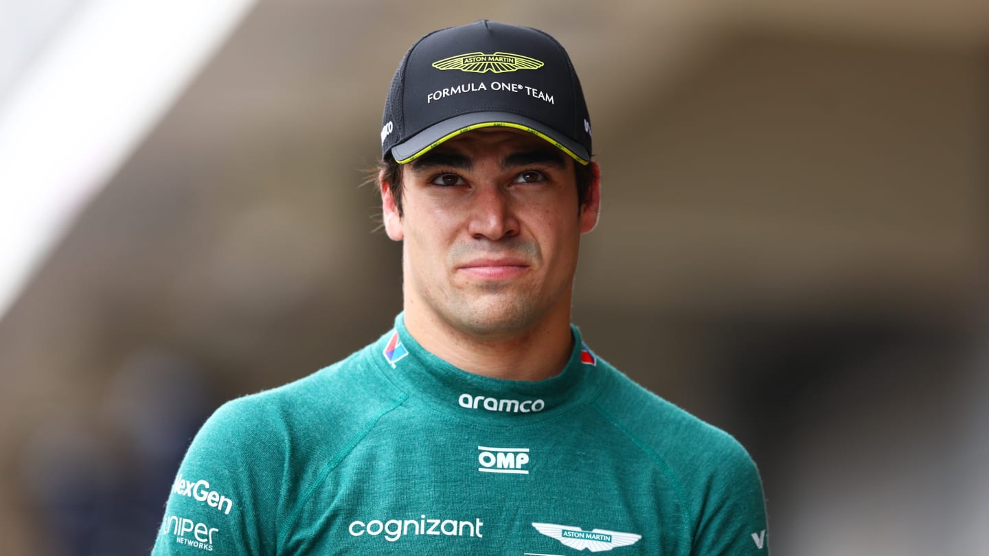 BARCELONA, SPAIN - JUNE 22: 18th placed qualifier Lance Stroll of Canada and Aston Martin F1 Team walks in the Pitlane during qualifying ahead of the F1 Grand Prix of Spain at Circuit de Barcelona-Catalunya on June 22, 2024 in Barcelona, Spain. (Photo by Clive Rose - Formula 1/Formula 1 via Getty Images)