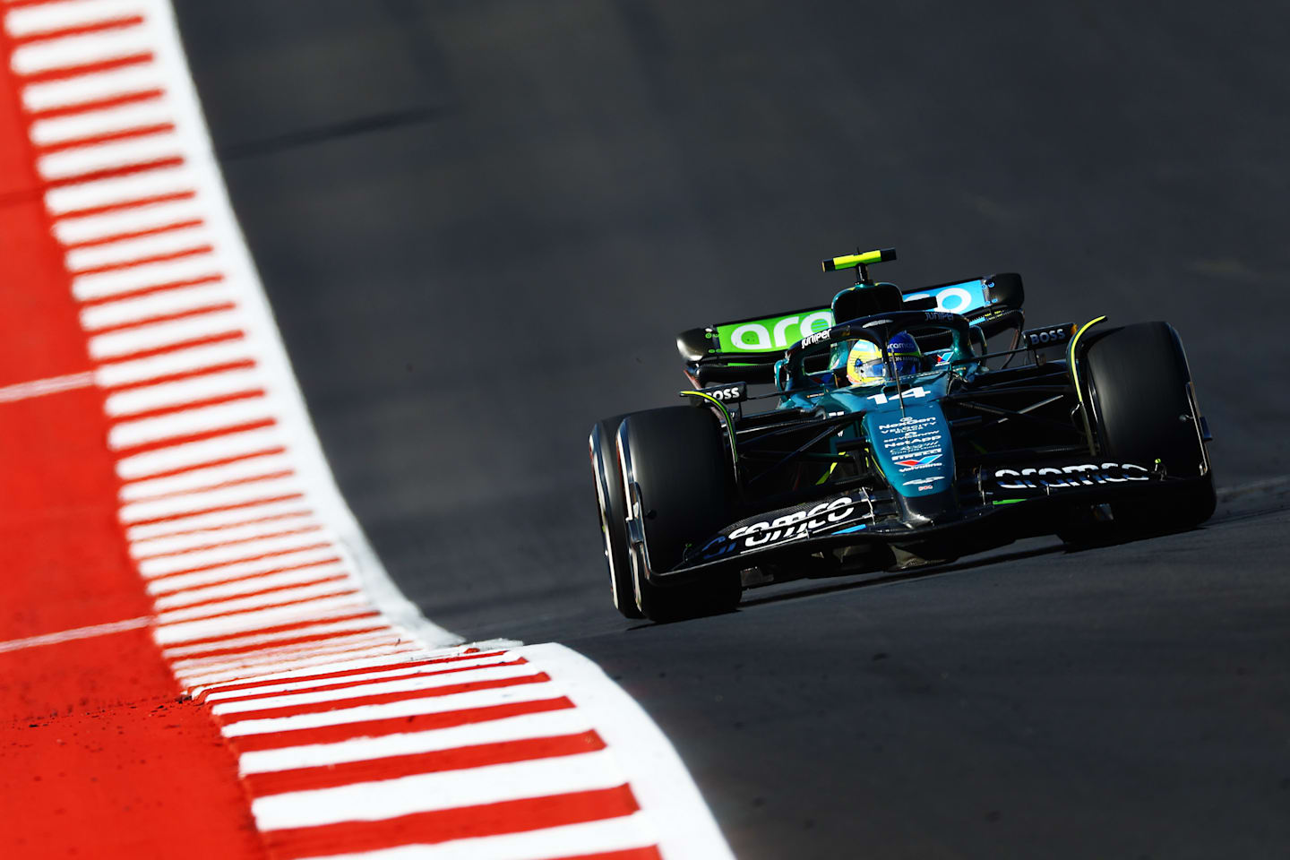 AUSTIN, TEXAS - OCTOBER 20: Fernando Alonso of Spain driving the (14) Aston Martin AMR24 Mercedes