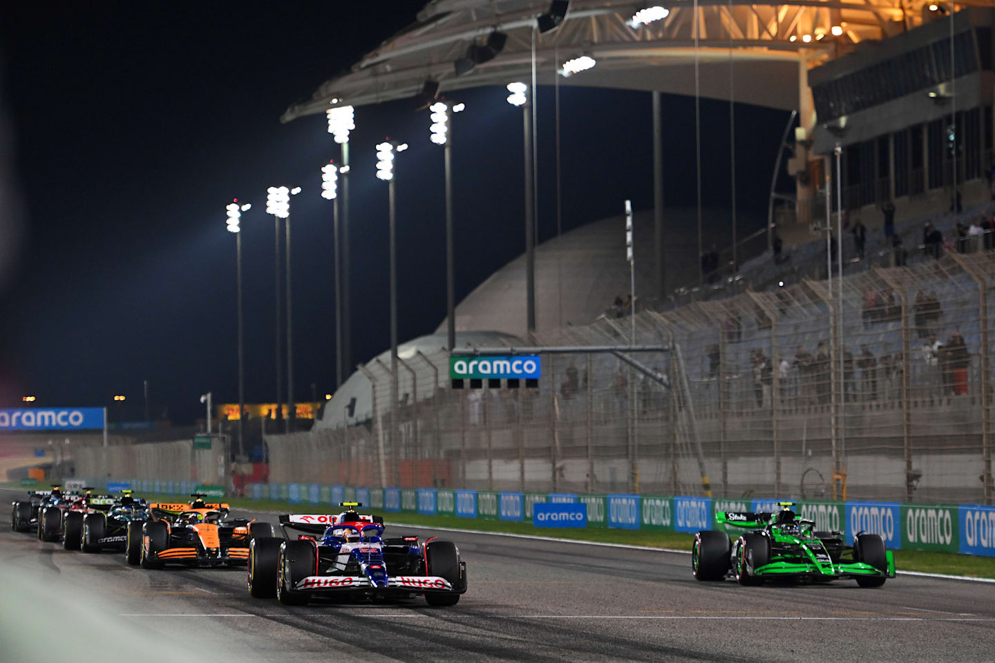 Yuki Tsunoda driving the (22) Visa Cash App RB VCARB 01 and Zhou Guanyu driving the (24) Kick Sauber C44 Ferrari practice the start procedure at F1 Testing at Bahrain International Circuit on February 23, 2024. (Photo by Rudy Carezzevoli/Getty Images)