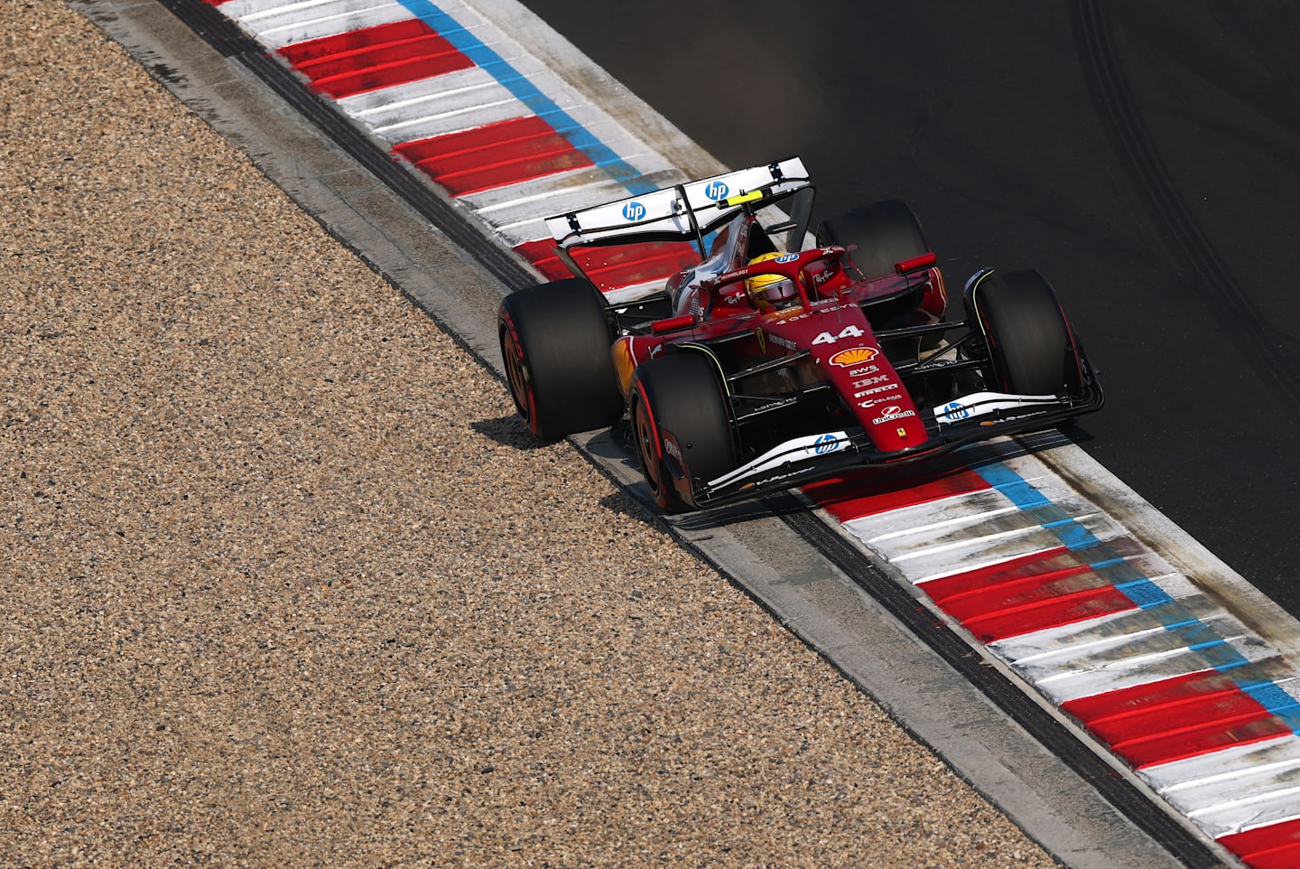 SHANGHAI, CHINA - MARCH 22: Lewis Hamilton of Great Britain driving the (44) Scuderia Ferrari SF-25