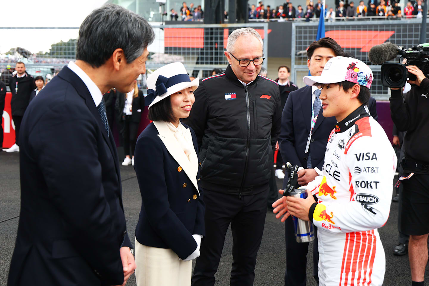 SUZUKA, JAPAN - APRIL 06: Princess Akiko of Mikasa meets Yuki Tsunoda of Japan and Oracle Red Bull