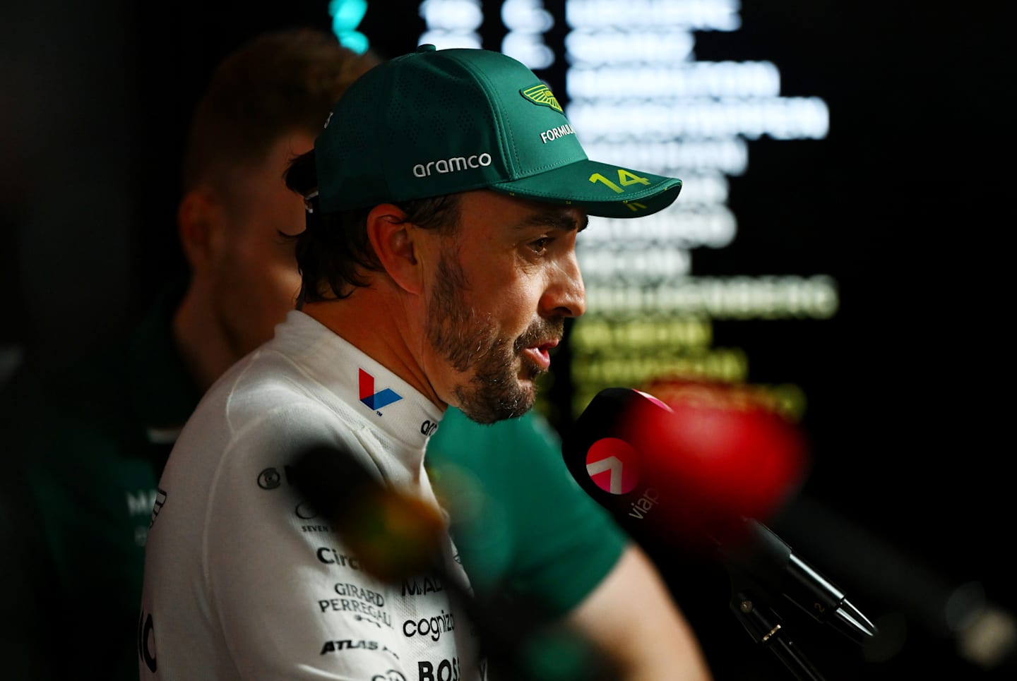 BAHRAIN, BAHRAIN - APRIL 12: Thirteenth placed qualifier Fernando Alonso of Spain and Aston Martin