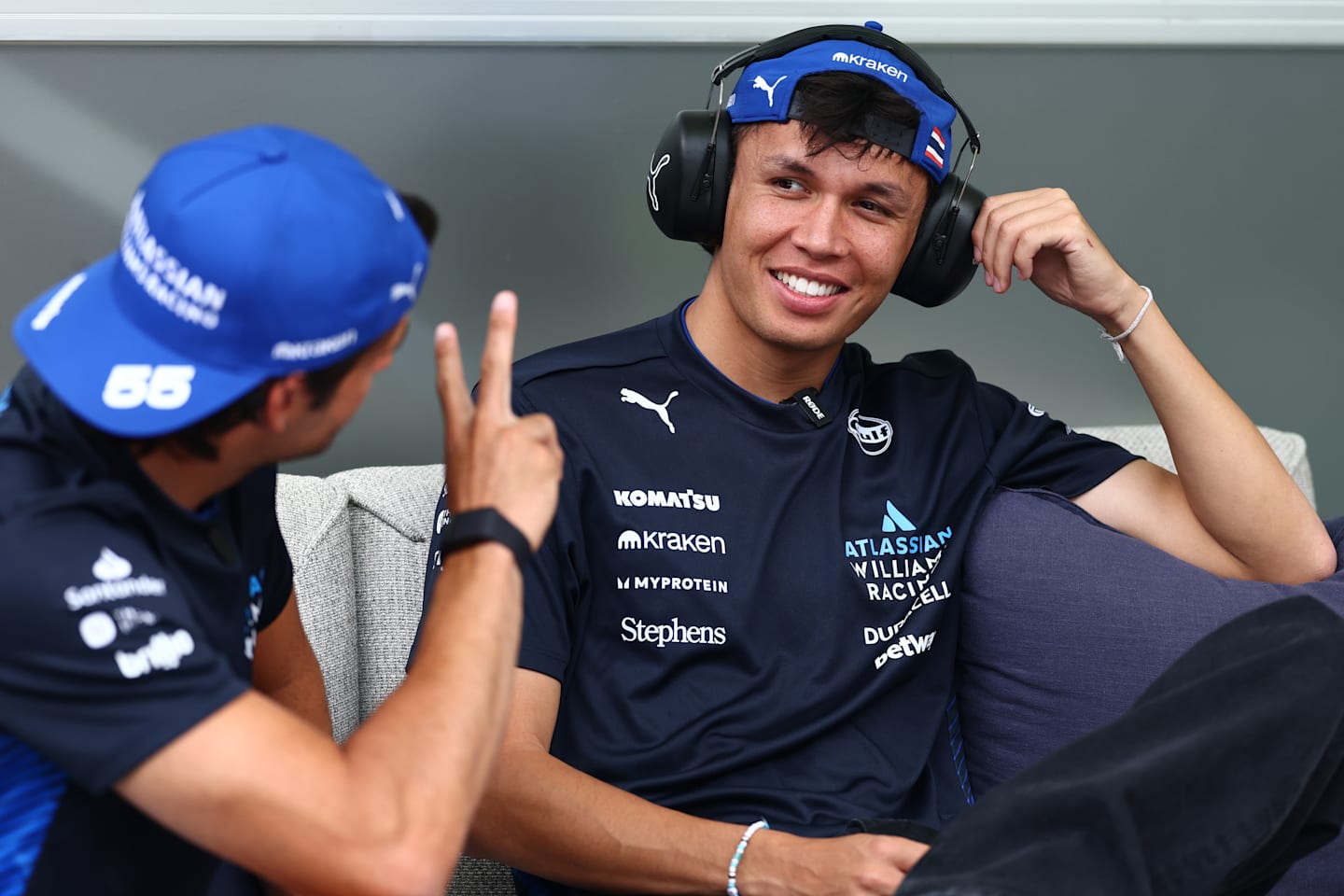 MIAMI, FLORIDA - MAY 01: Carlos Sainz of Spain and Williams talks with Alexander Albon of Thailand