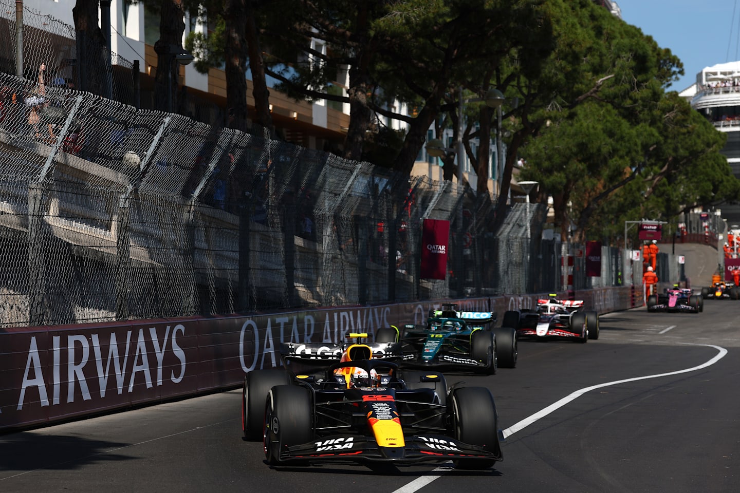 Yuki Tsunoda leads Lance Stroll and Oliver Bearman of Great Britain driving the (87) Haas F1 VF-25 Ferrari on track during the F1 Grand Prix of Monaco at Circuit de Monaco on May 25, 2025 in Monte-Carlo, Monaco. (Photo by Mark Thompson/Getty Images)