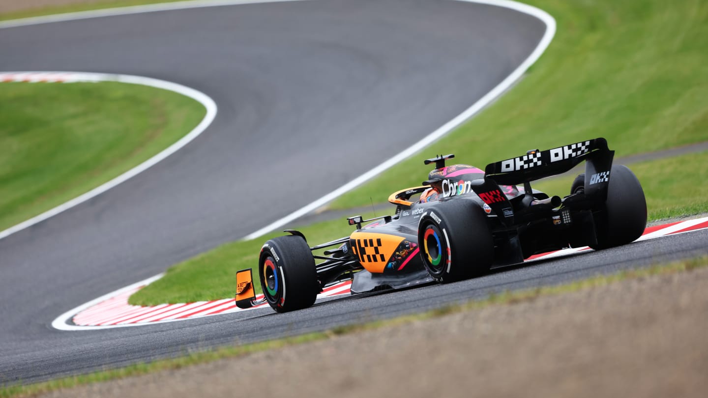 SUZUKA, JAPAN - OCTOBER 08: Daniel Ricciardo of Australia driving the (3) McLaren MCL36 Mercedes on