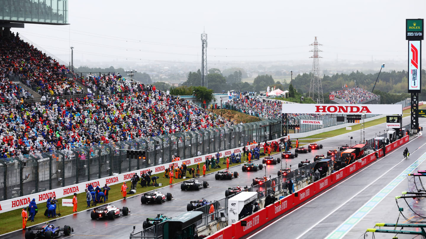 SUZUKA, JAPAN - OCTOBER 09: A rear view of the grid preparations during the F1 Grand Prix of Japan