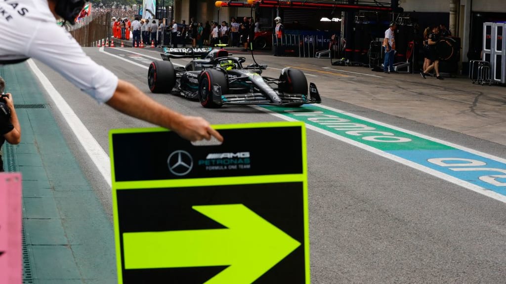 Mercedes' British driver Lewis Hamilton leaves the pit during the qualifying session of the Formula