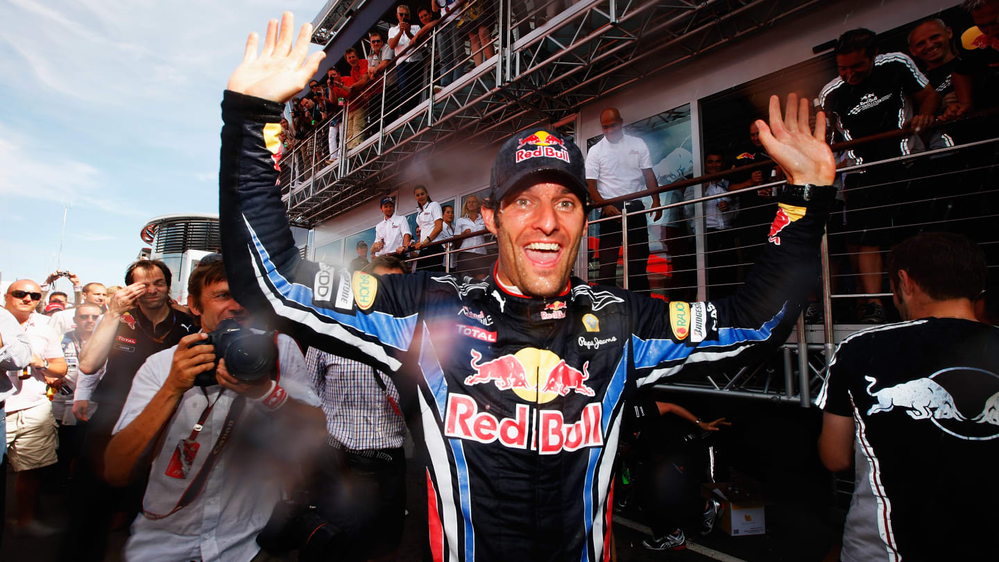 NORTHAMPTON, UNITED KINGDOM - JULY 11:  Mark Webber of Australia and Red Bull Racing celebrates