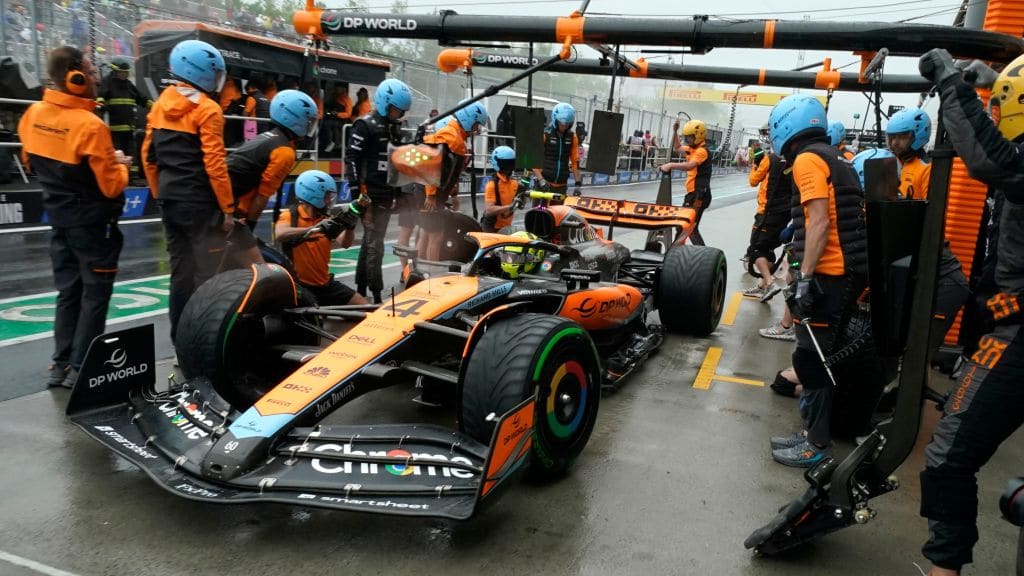 McLaren's British driver Lando Norris makes a pit stop during the third practice session for the