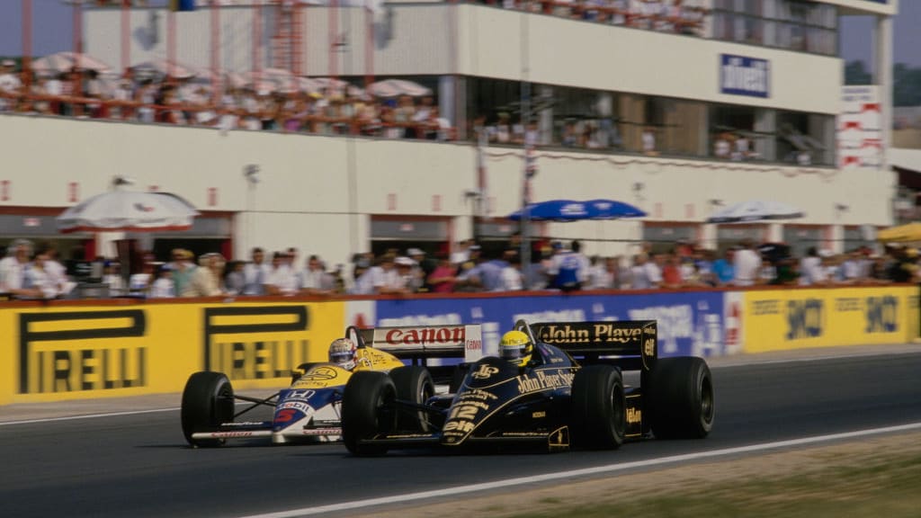Ayrton Senna from Brazil driving the #12 John Player Special Team Lotus-Renault 98T Renault V6 and