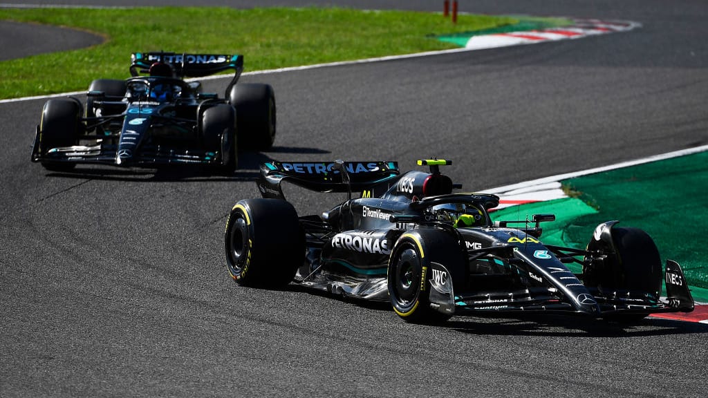 SUZUKA, JAPAN - SEPTEMBER 24: Lewis Hamilton of Great Britain driving the (44) Mercedes AMG