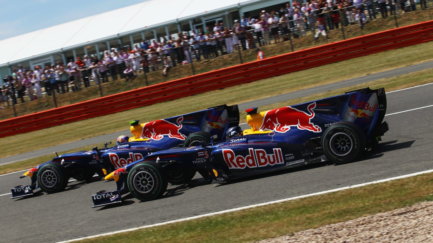 NORTHAMPTON, UNITED KINGDOM - JULY 11:  Mark Webber (L) of Australia and Red Bull Racing and team